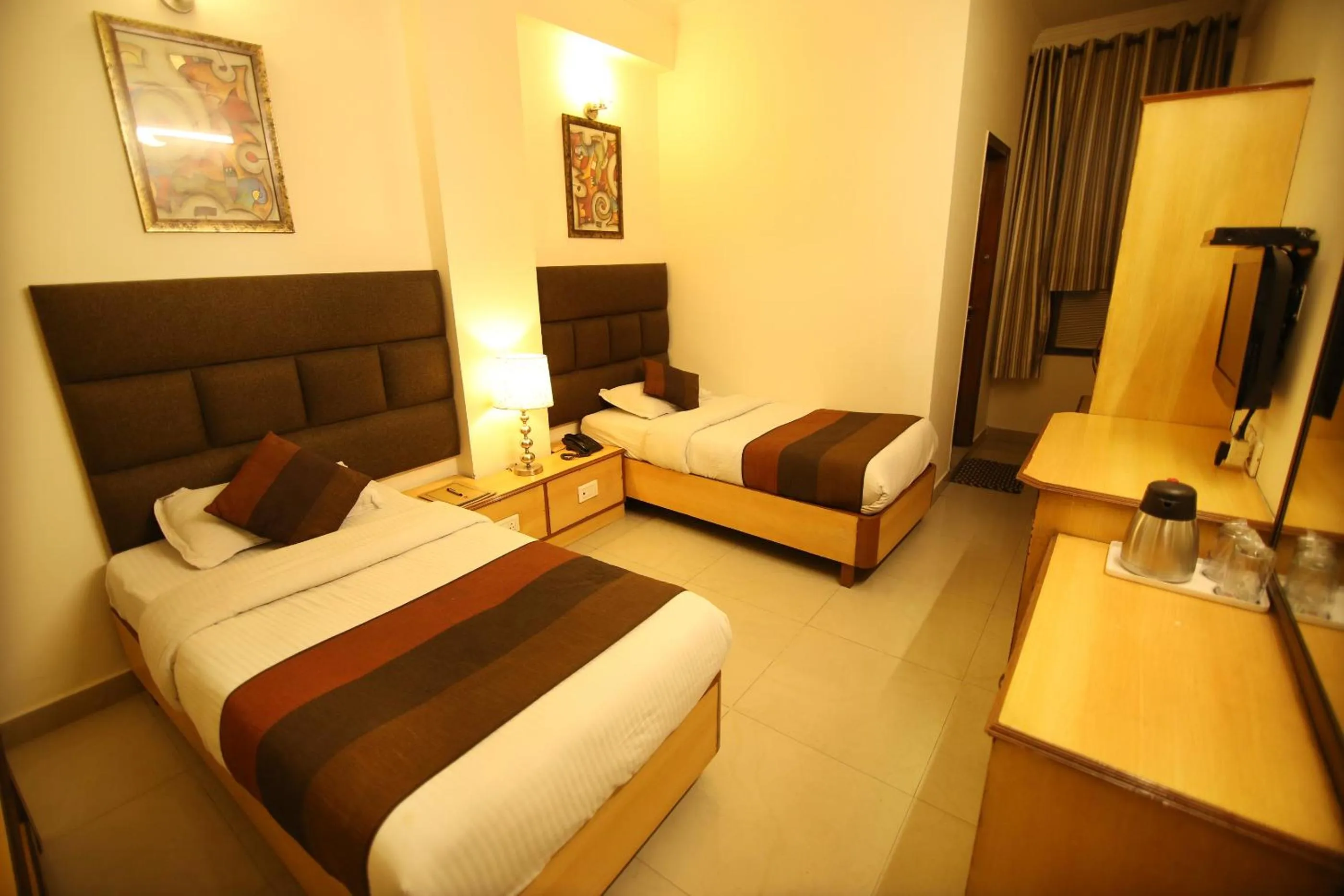 Bed in Hotel Parkway Deluxe