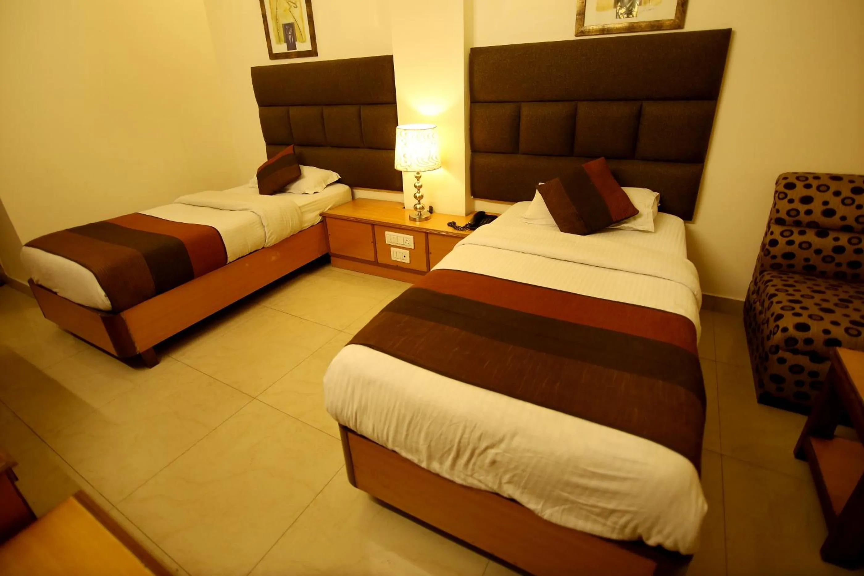 Bed in Hotel Parkway Deluxe