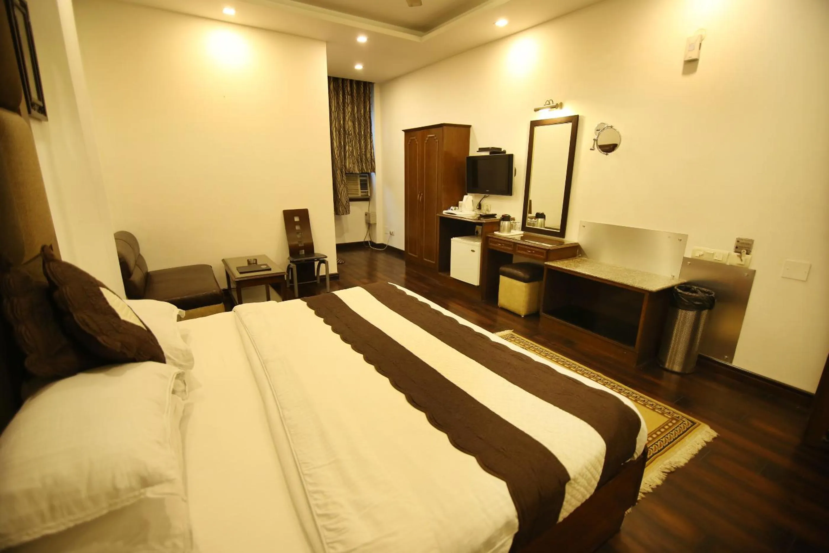 Bed in Hotel Parkway Deluxe