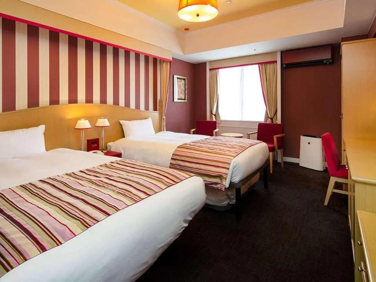 Bed in Hotel Monterey Kyoto