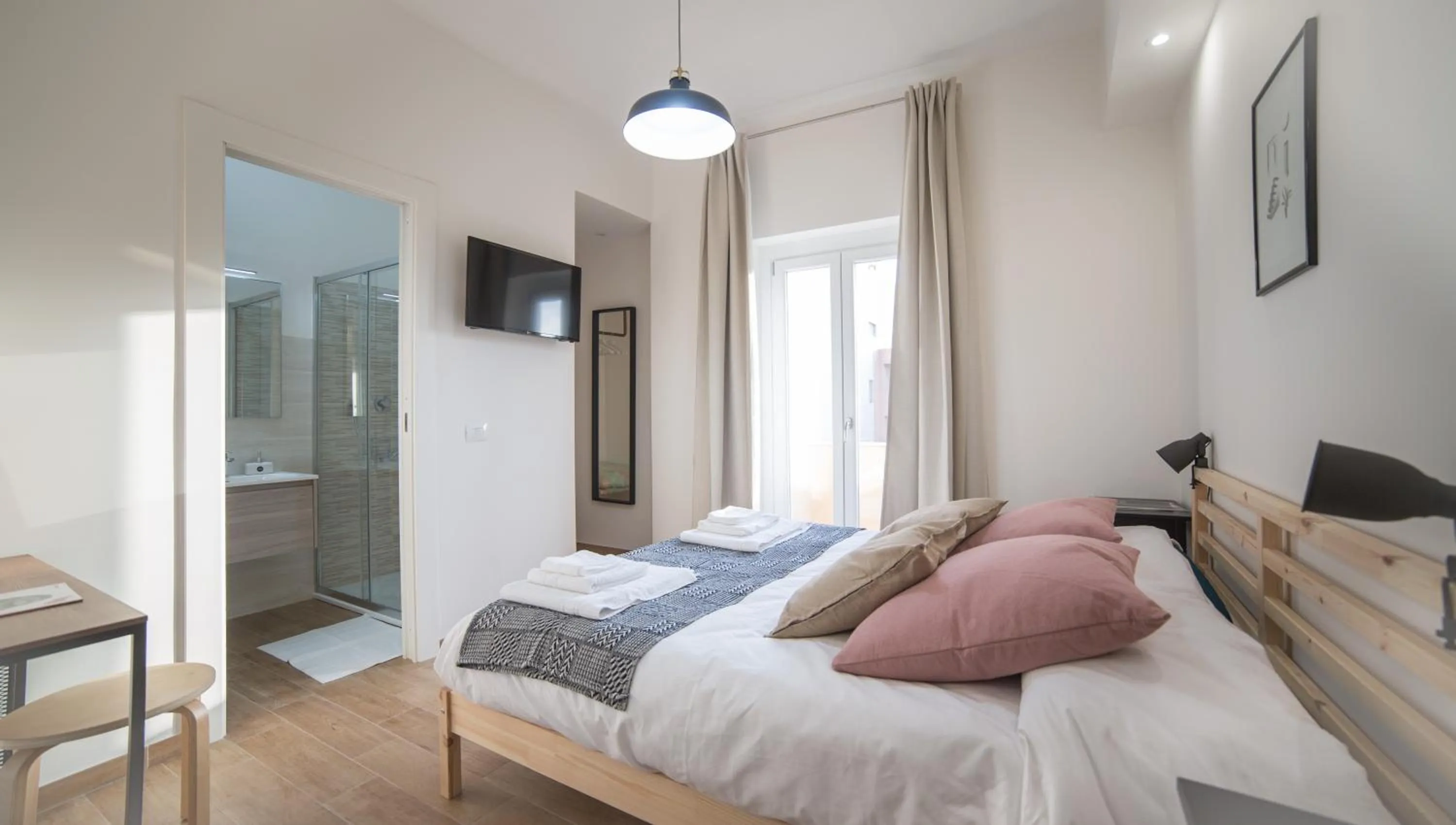 Bed in Cramu Bed&Breakfast