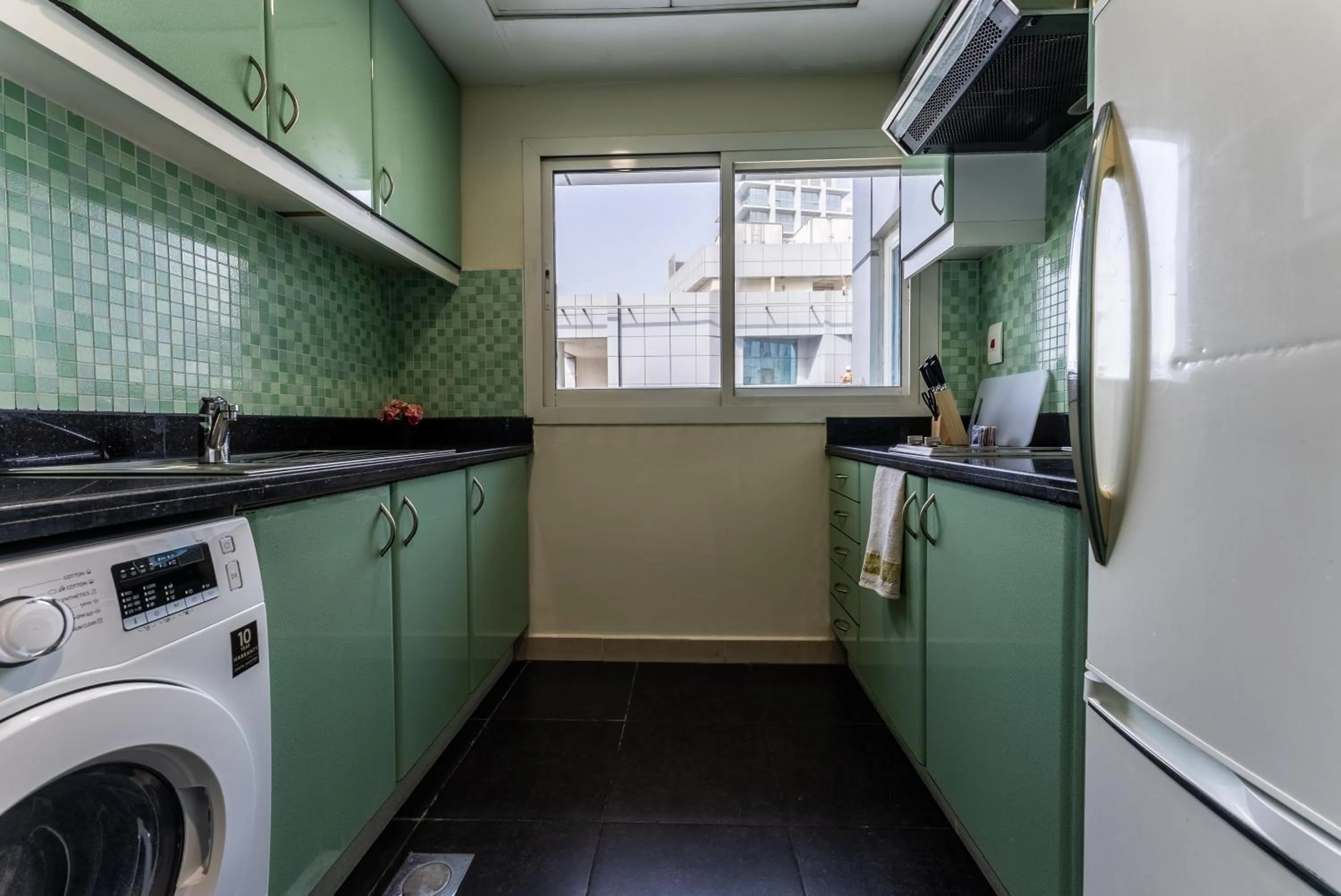 Kitchen or kitchenette in Gulf Oasis Hotel Apartments Fz LLC