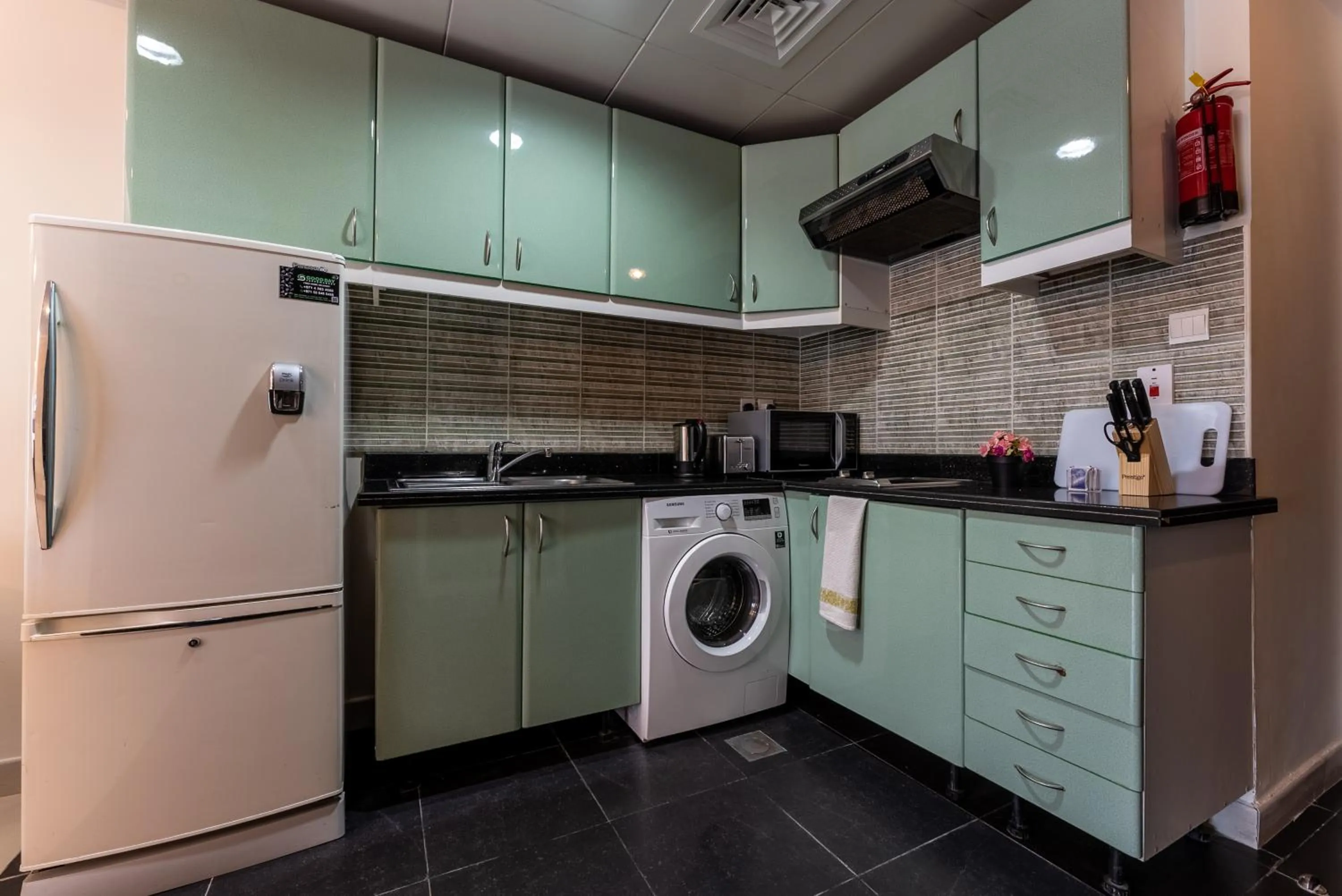 Kitchen or kitchenette in Gulf Oasis Hotel Apartments Fz LLC