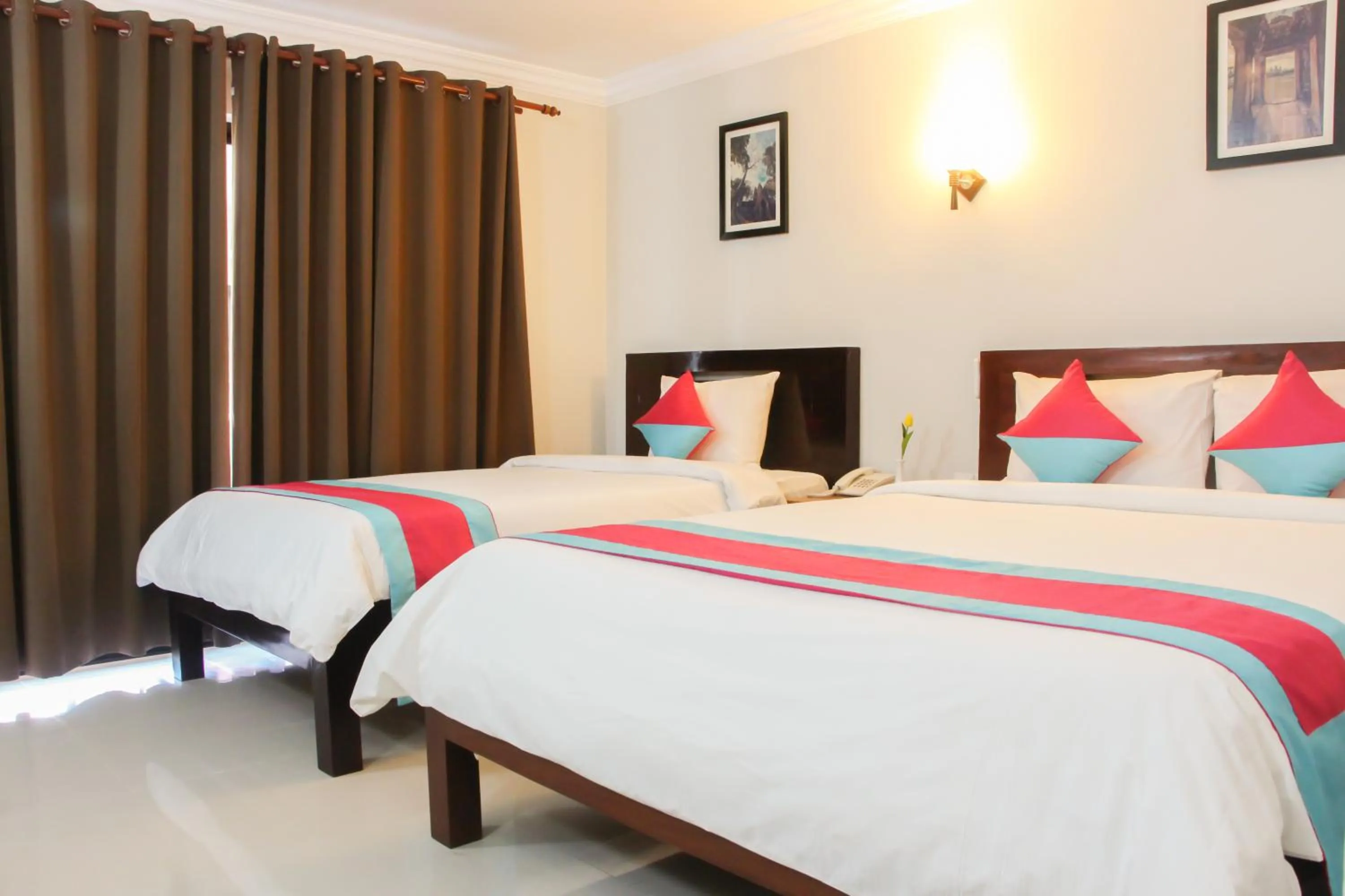 Bed in Ratana Angkor Hotel