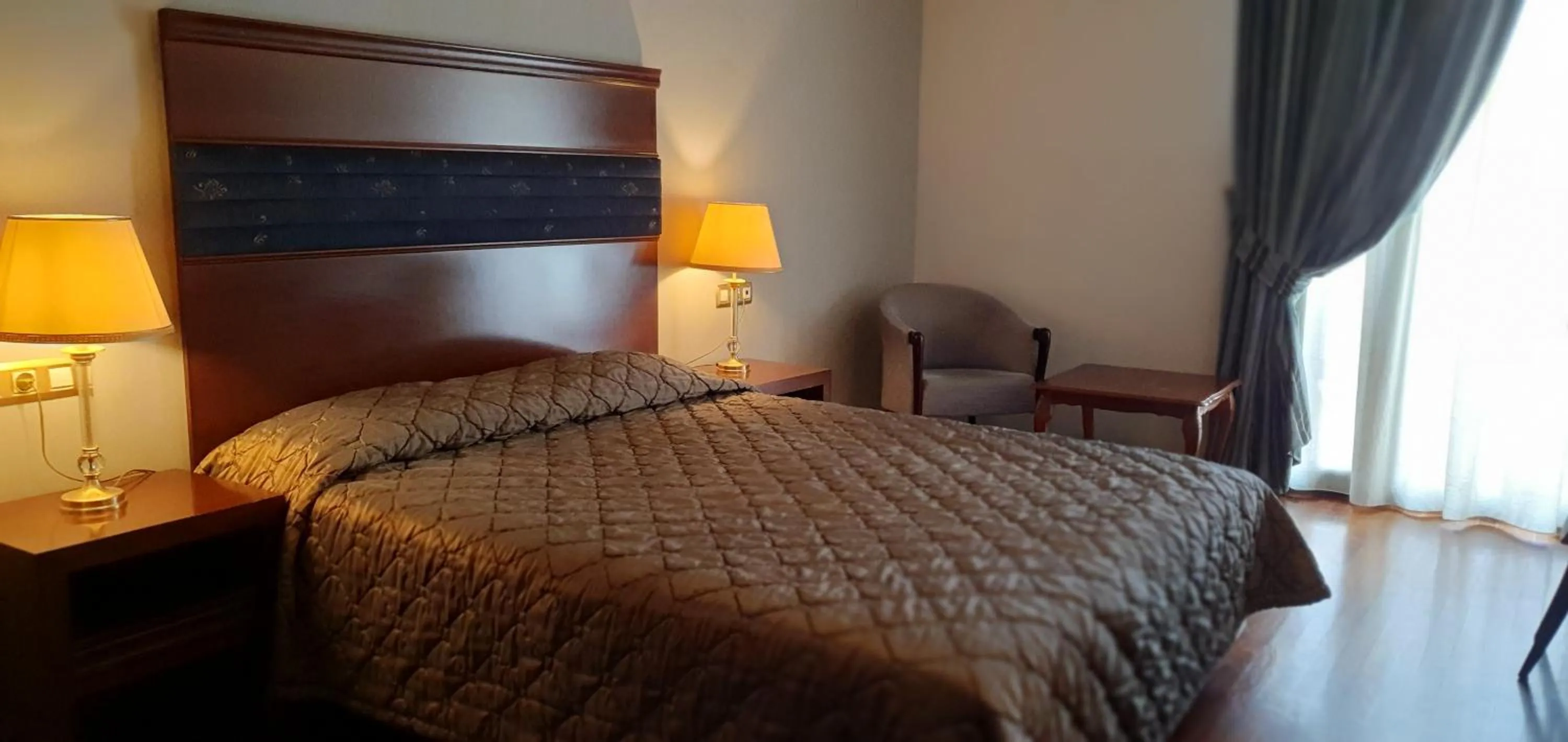 Bed in Aeton Melathron Hotel