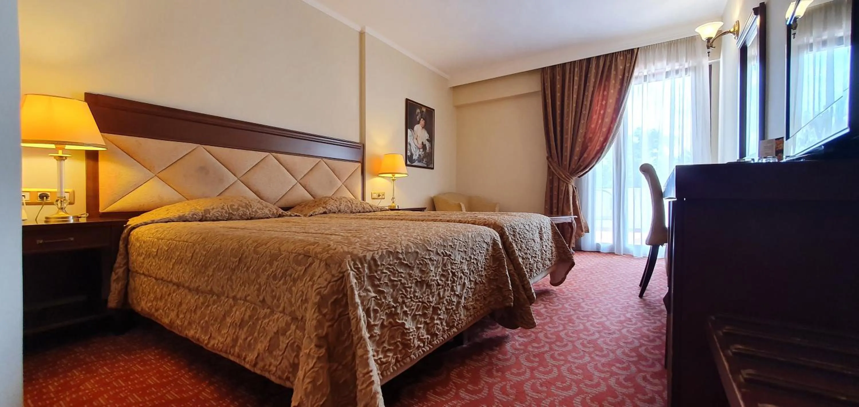 Bed in Aeton Melathron Hotel