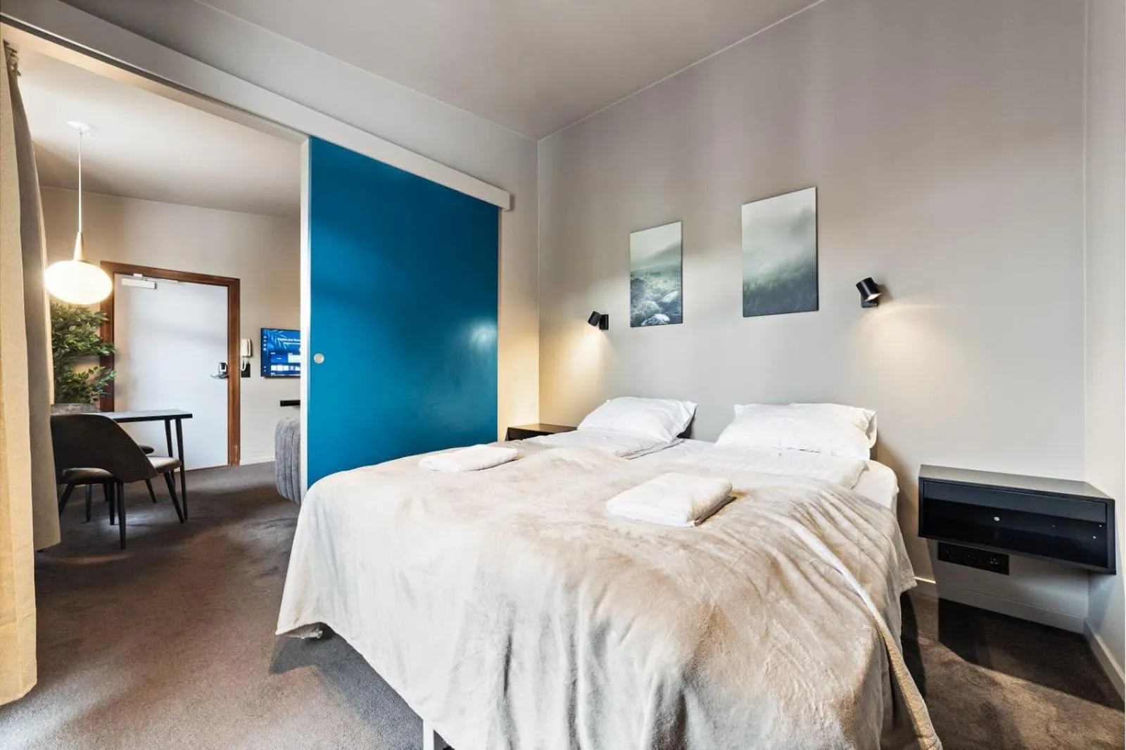 Bed in Astro Apartments