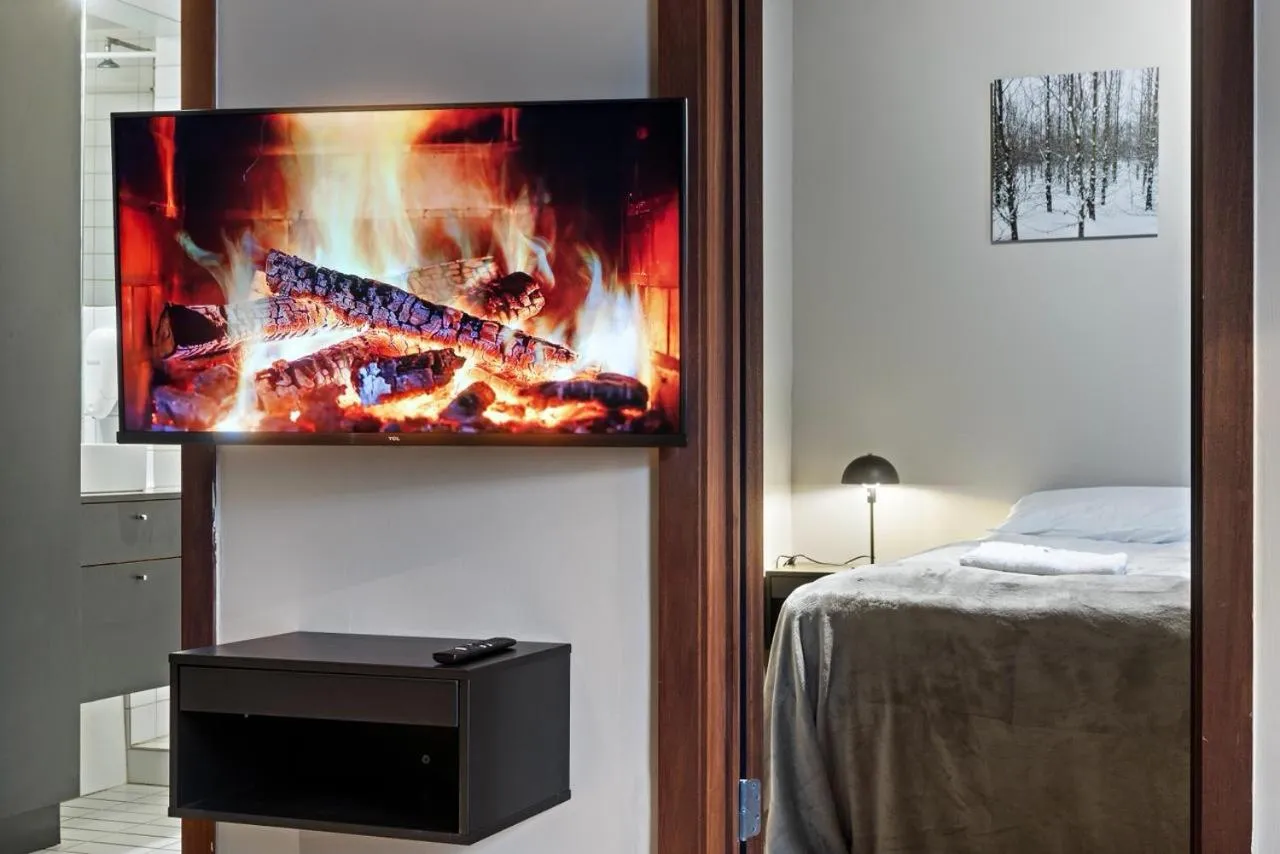 TV and multimedia, Bed in Astro Apartments