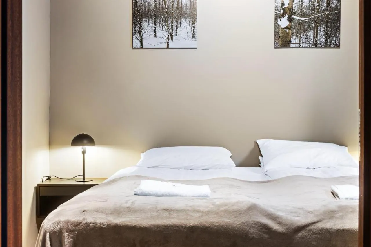 Bed in Astro Apartments