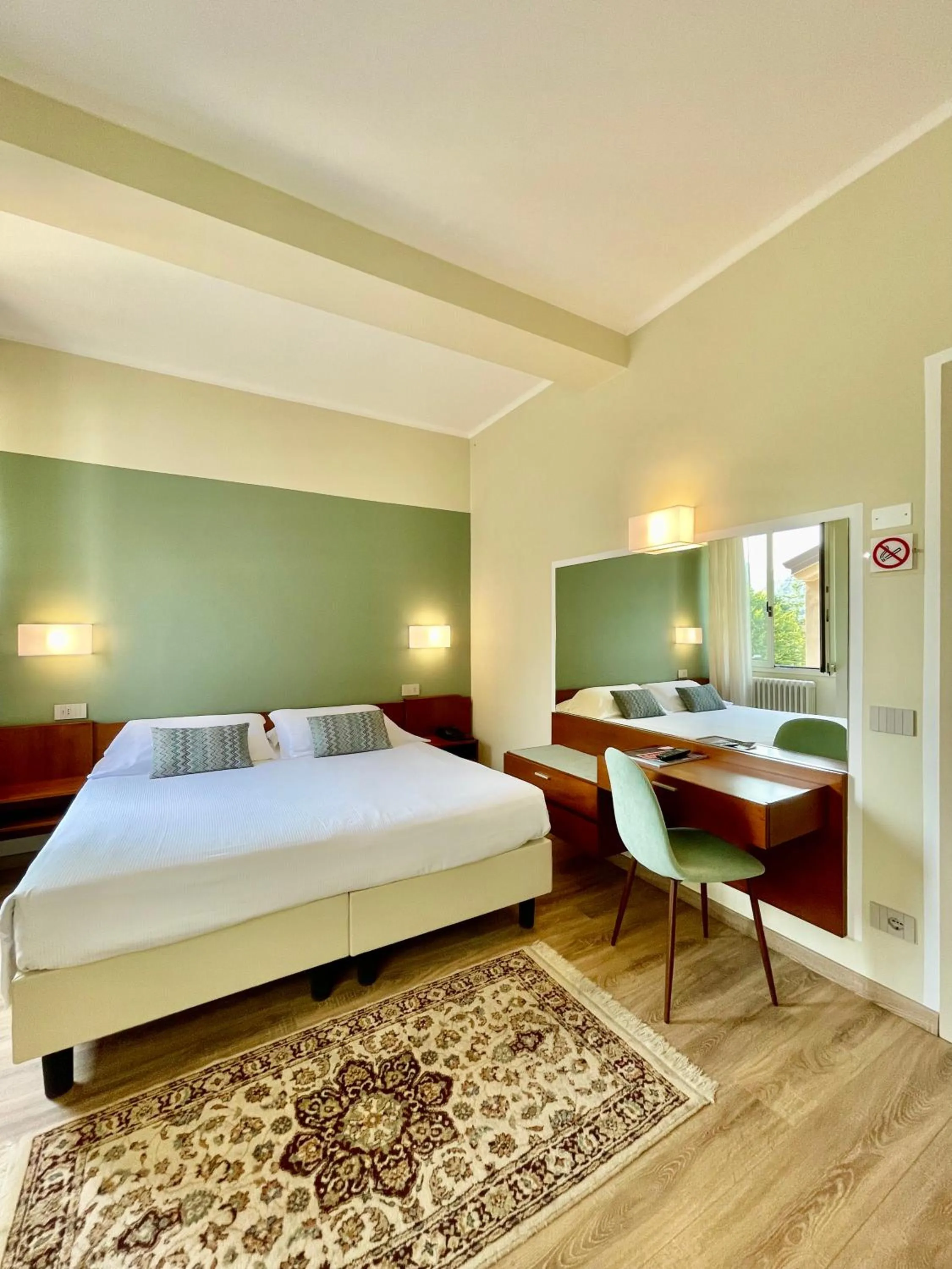 Bed in Hotel Brescia