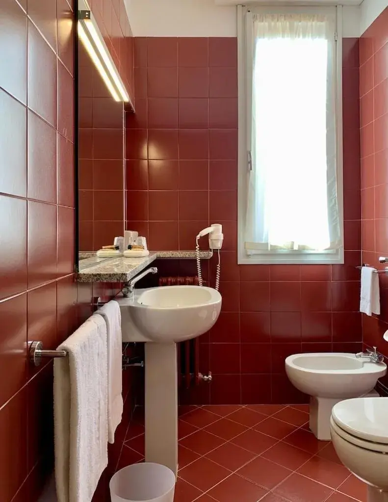 Standard Family Room in Hotel Brescia Standard Family Room in Hotel Brescia