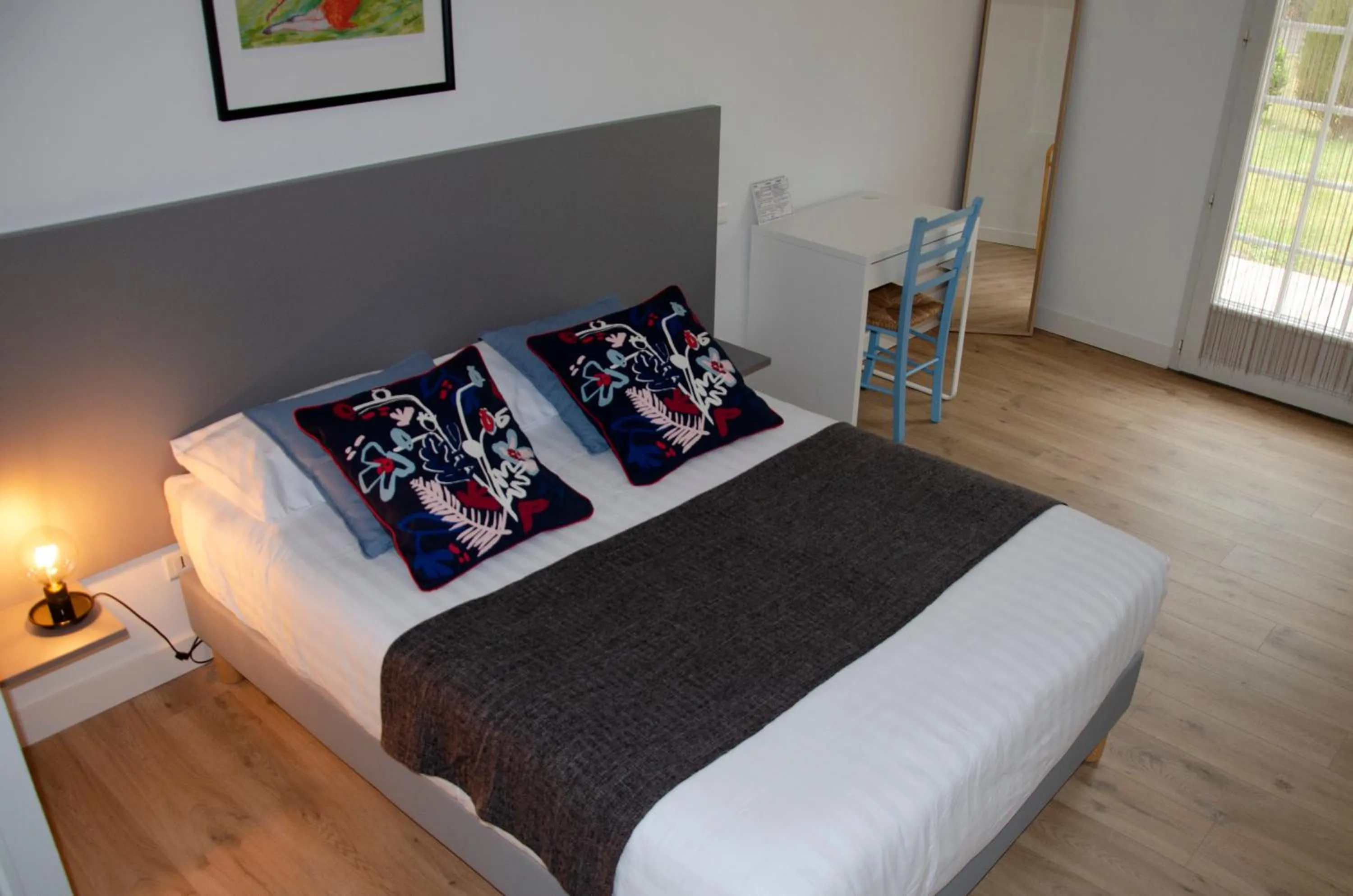 Bed in Hotel Aux Rochers de l'Ocean