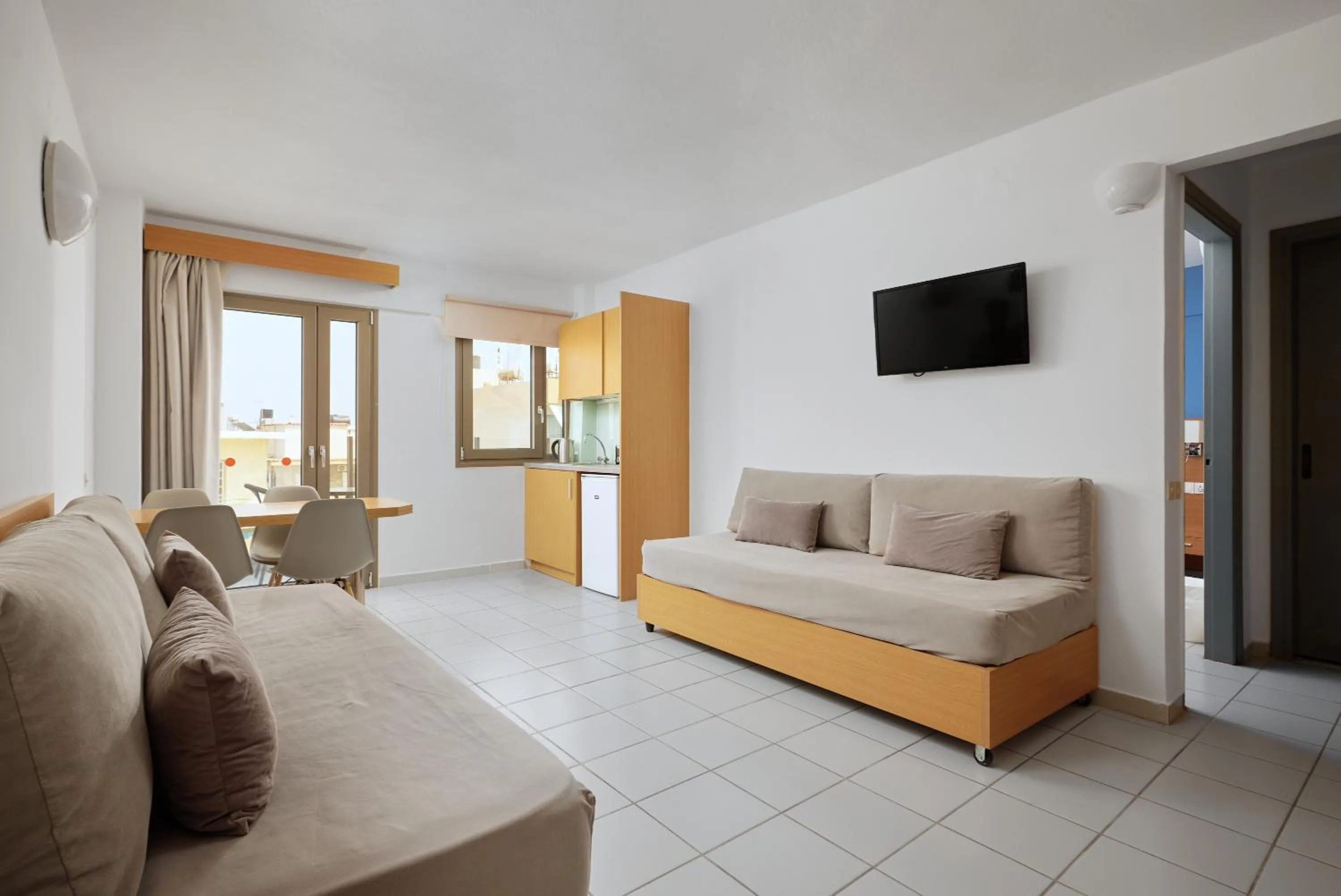 Bed in Acropolis Apartments