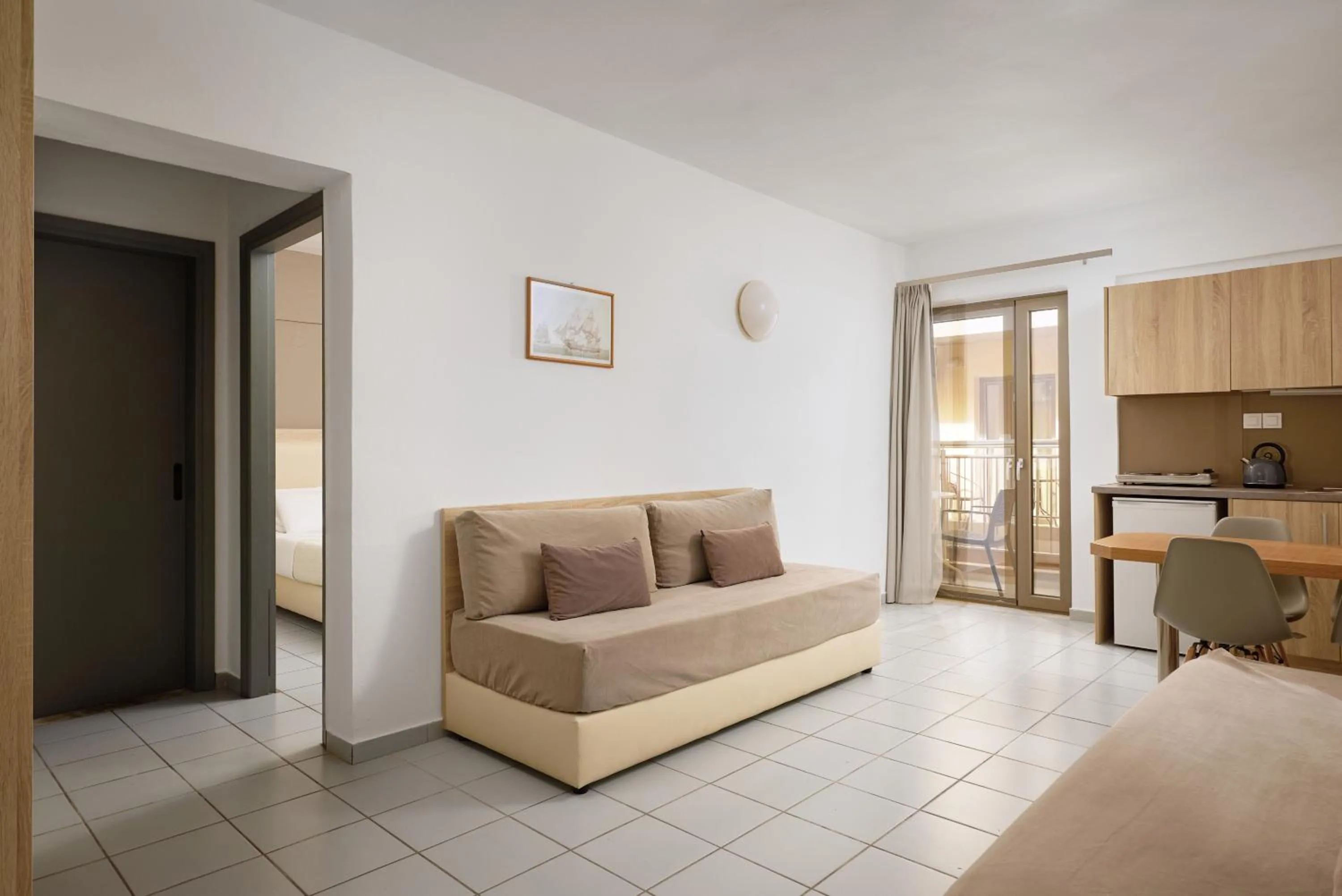 Bed in Acropolis Apartments