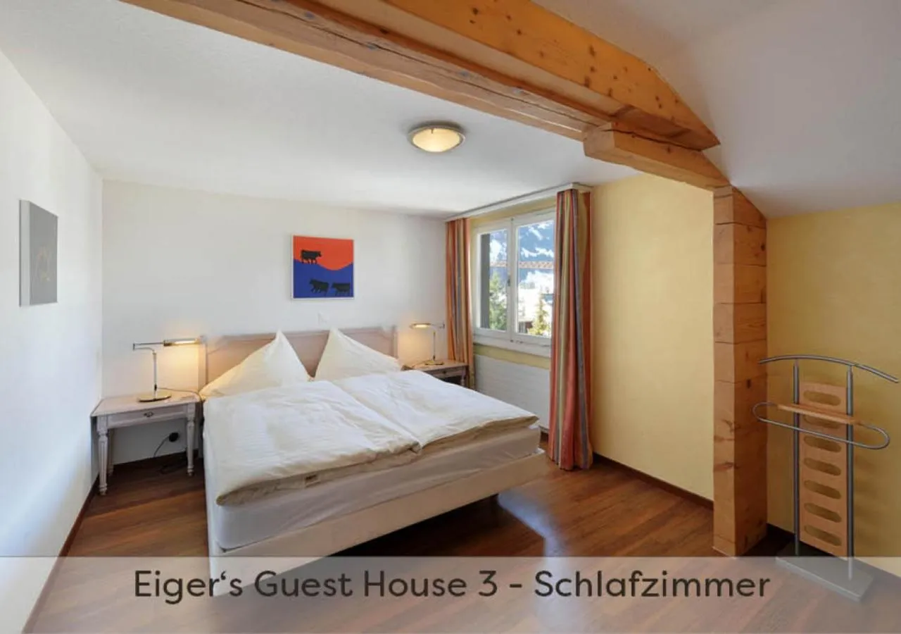 Photo of the whole room, Bed in Eiger Guest House - Grindelwald