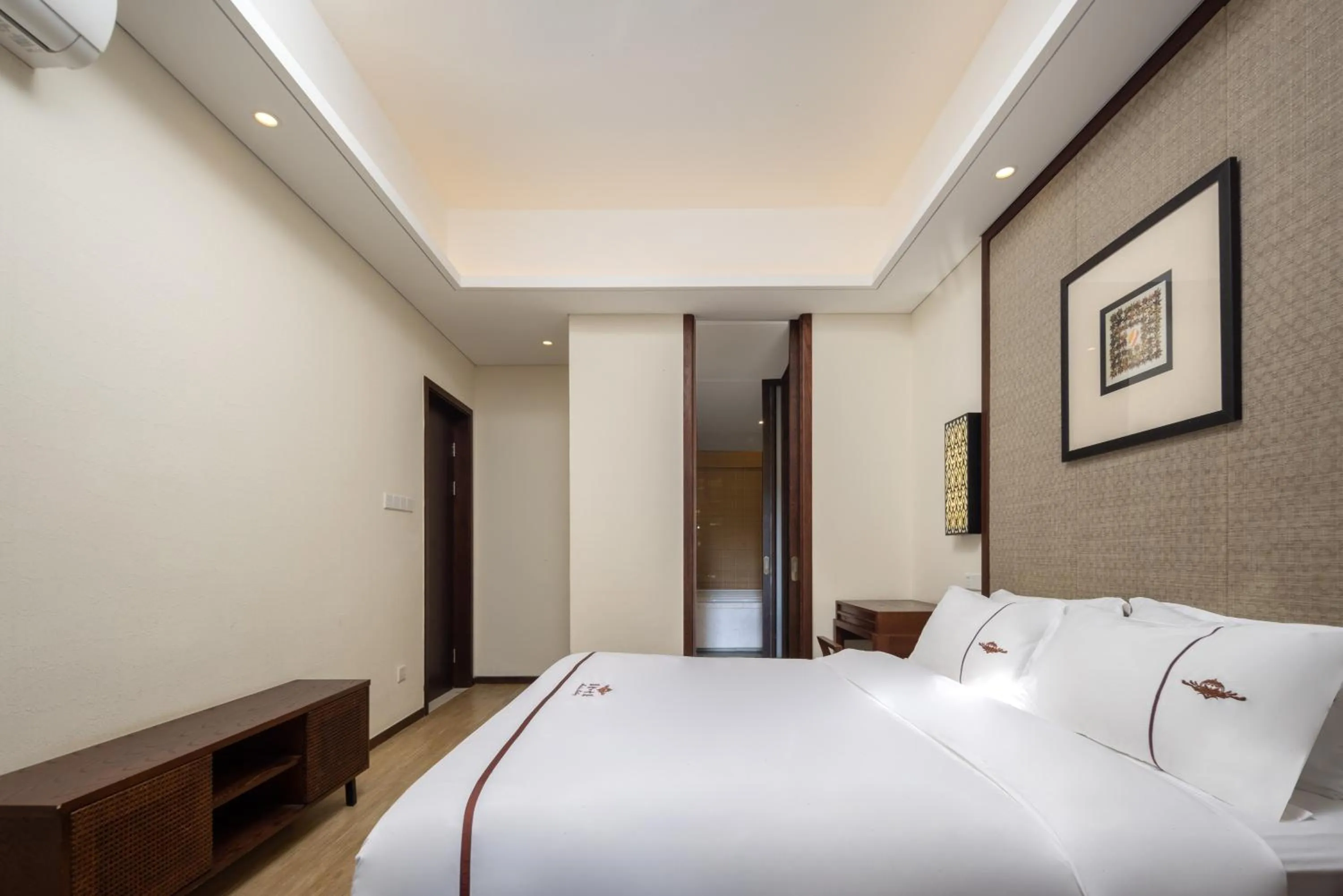 Bed in Iccssi Villa Haitang Bay Sanya