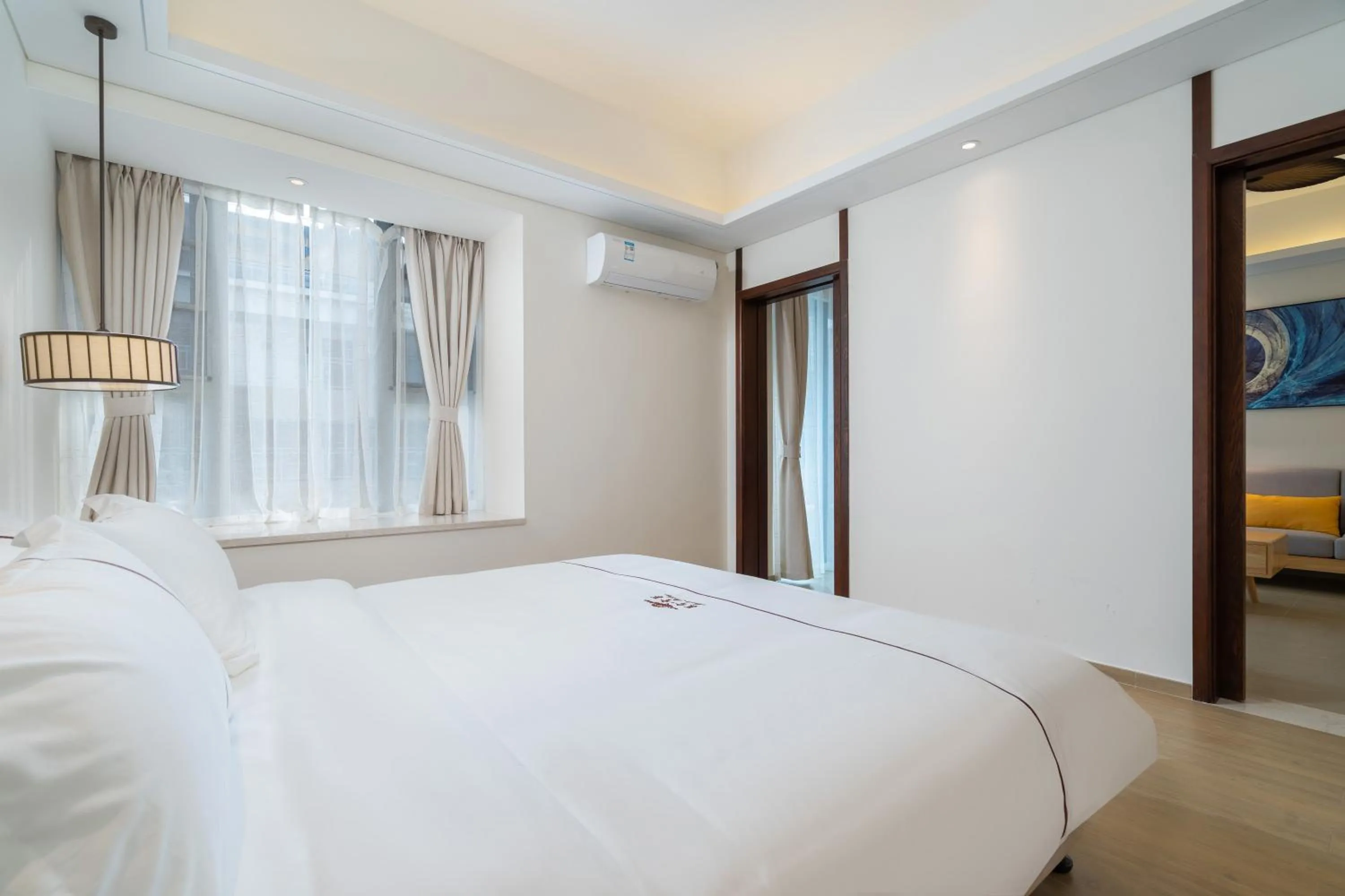 Bed in Iccssi Villa Haitang Bay Sanya