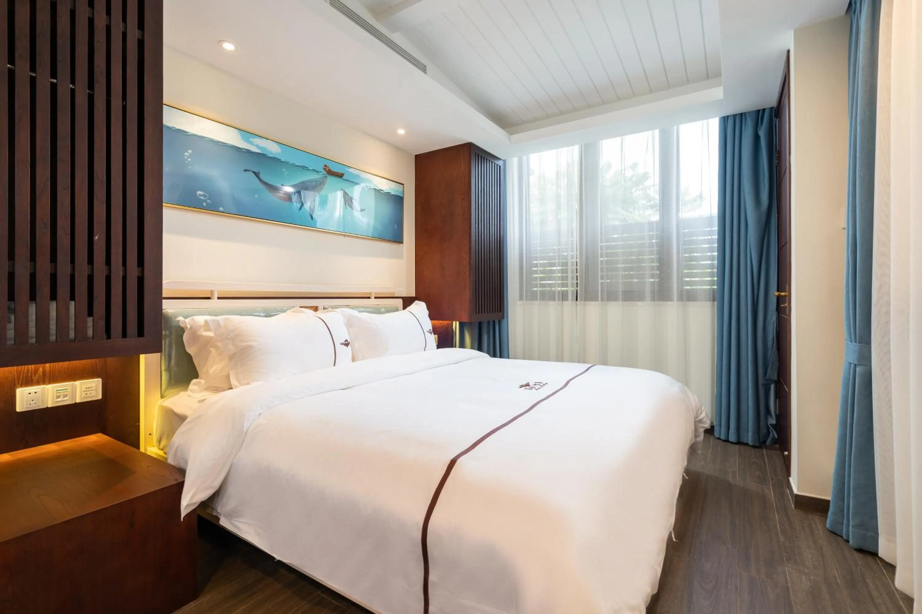 Bed in Iccssi Villa Haitang Bay Sanya