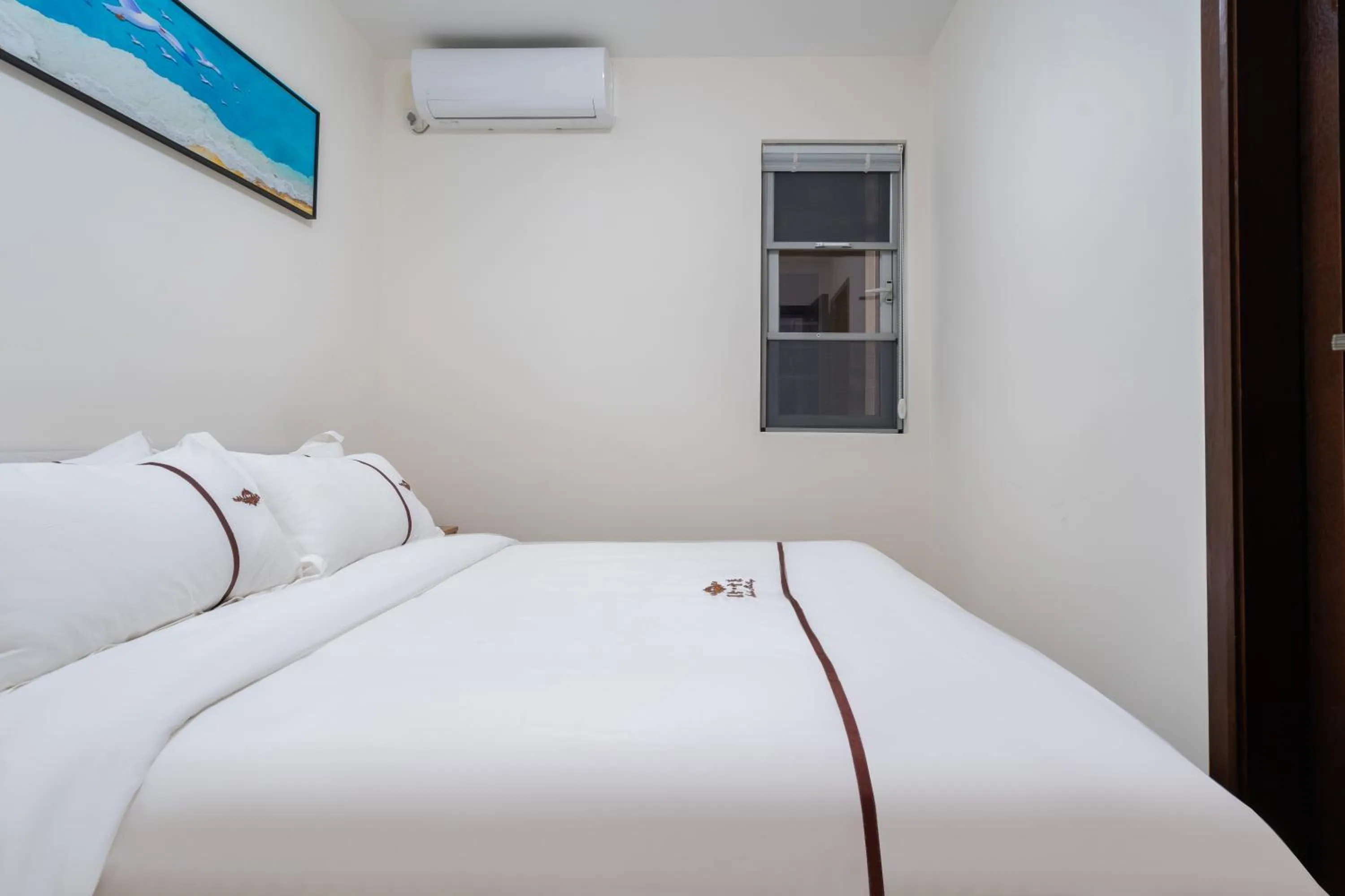 Bed in Iccssi Villa Haitang Bay Sanya