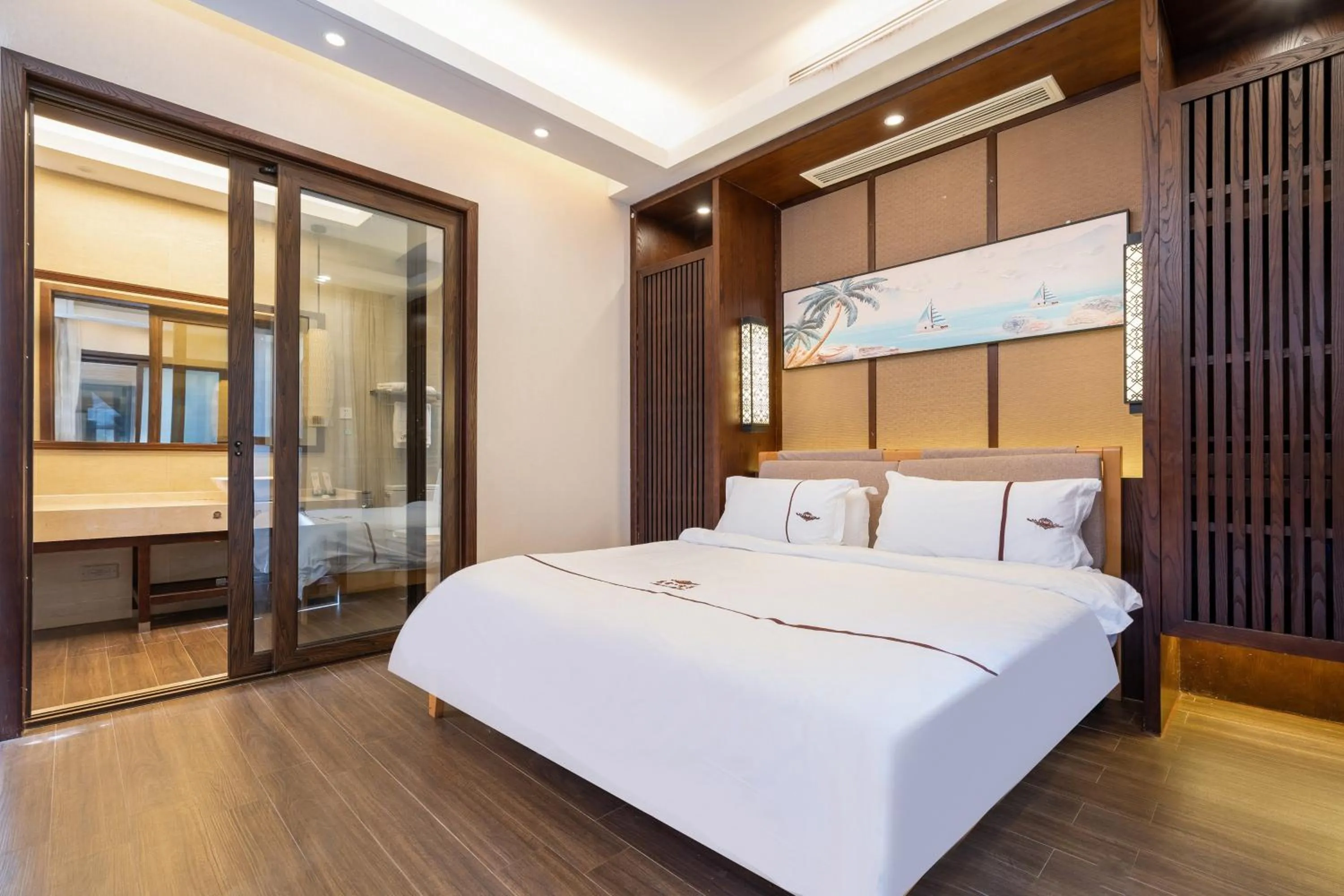 Bed in Iccssi Villa Haitang Bay Sanya