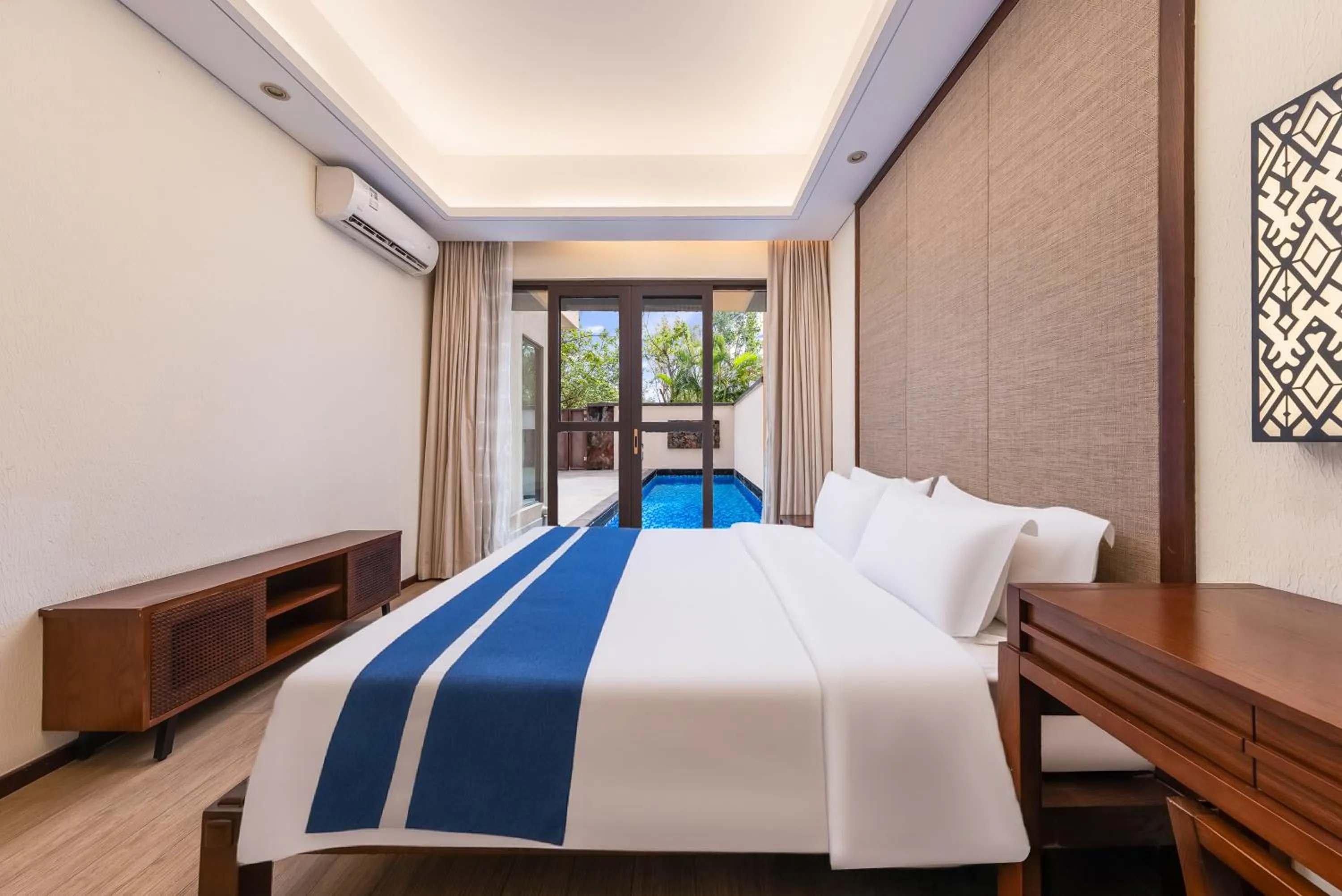 Bed in Iccssi Villa Haitang Bay Sanya