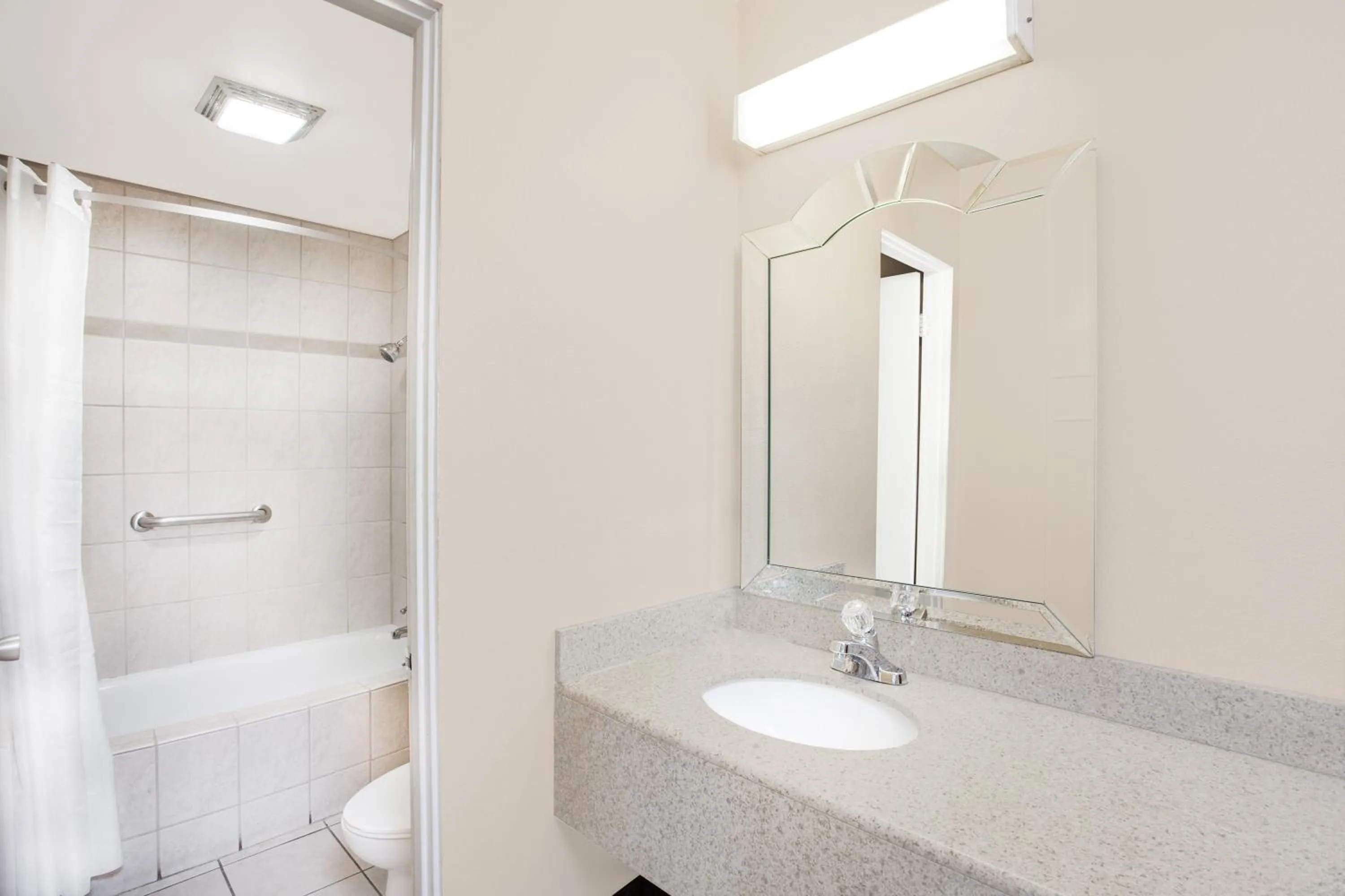 Toilet in Travelodge by Wyndham Barstow