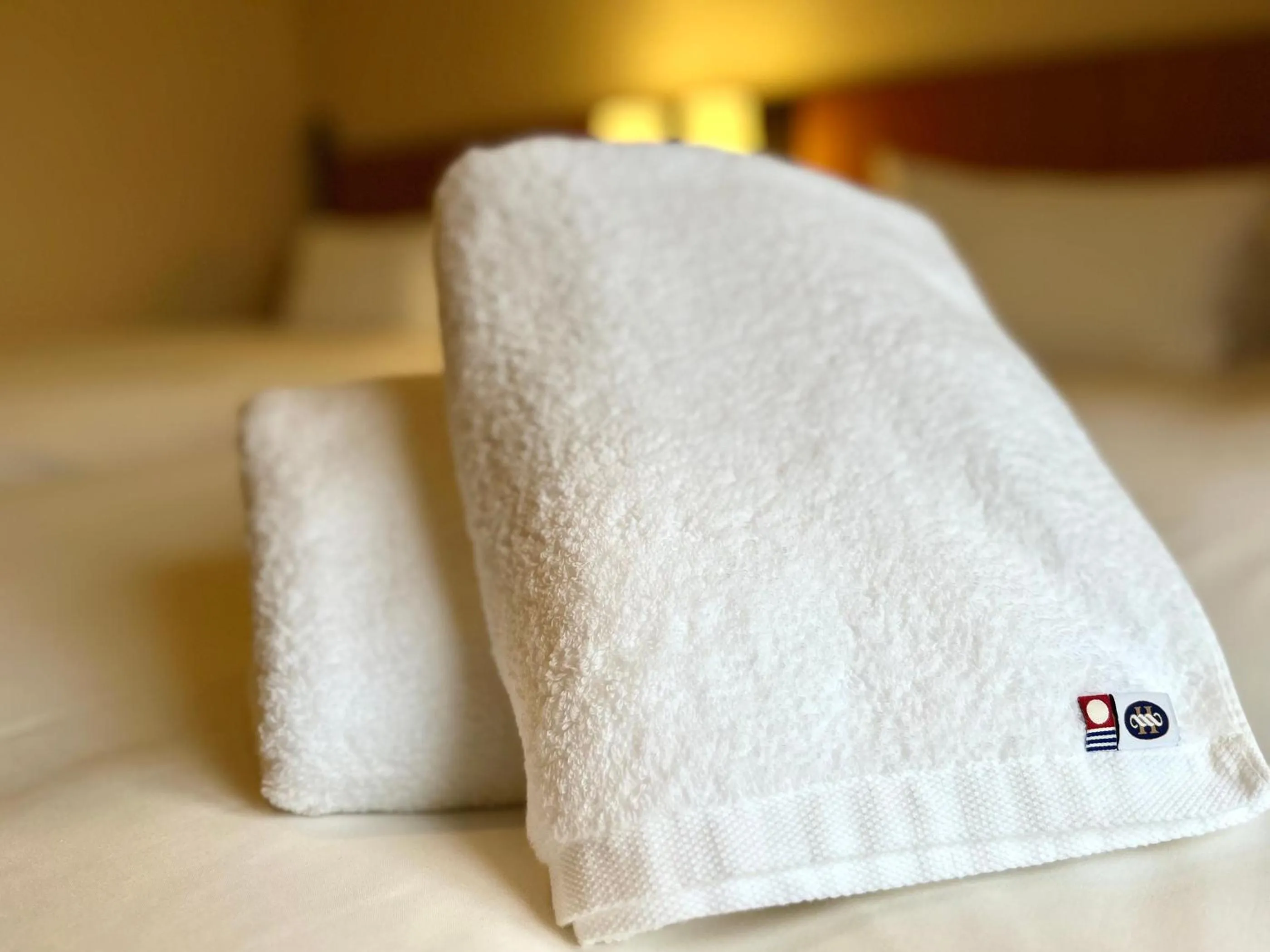 towels, Bed in Hotel Monterey Sendai