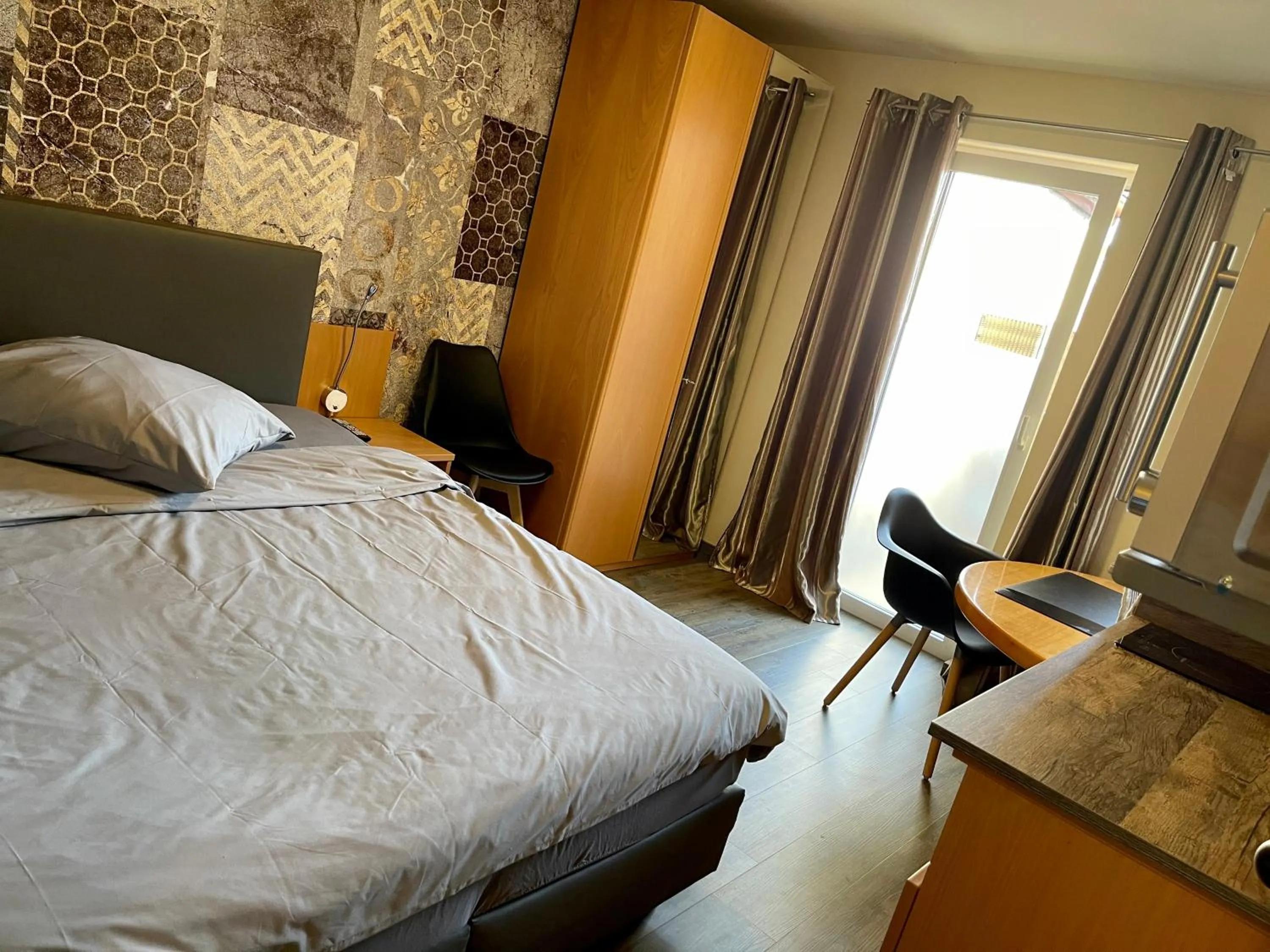 Bed in Hotel "Mythos Apartments" alle Zimmer mit Kochnische, Apartments mit Küche!