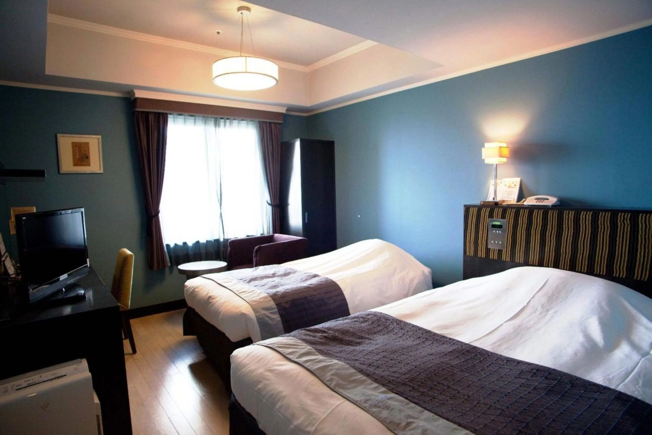 Photo of the whole room, Bed in Hotel Monterey La Soeur Osaka