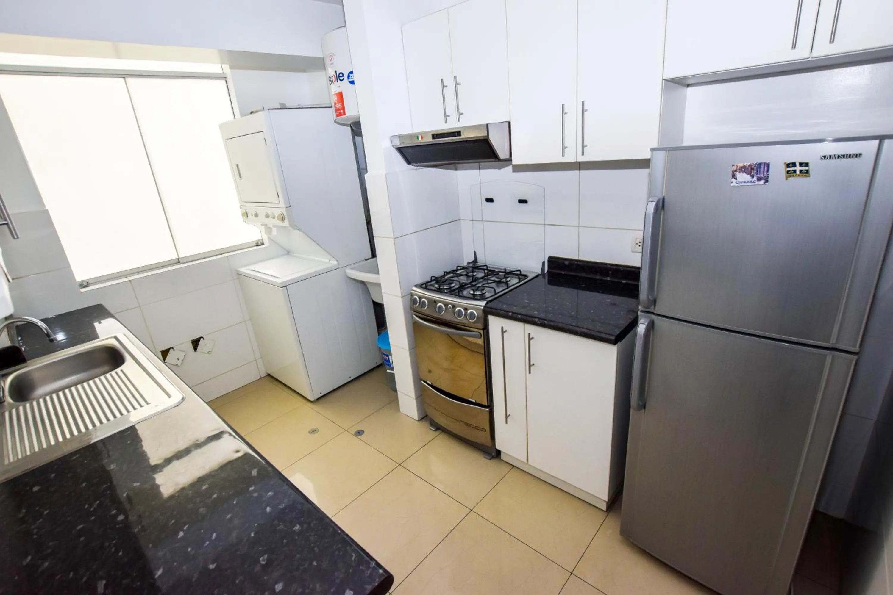 Kitchen or kitchenette in Miraflores Apartments 110 Alcanfores Street by Private Host
