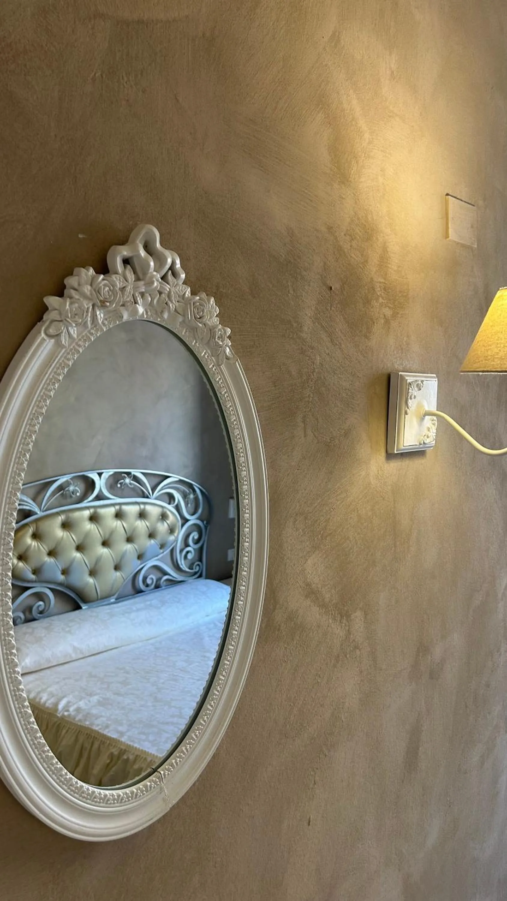 Decorative detail, Bed in Boutique Hotel Calais Milano