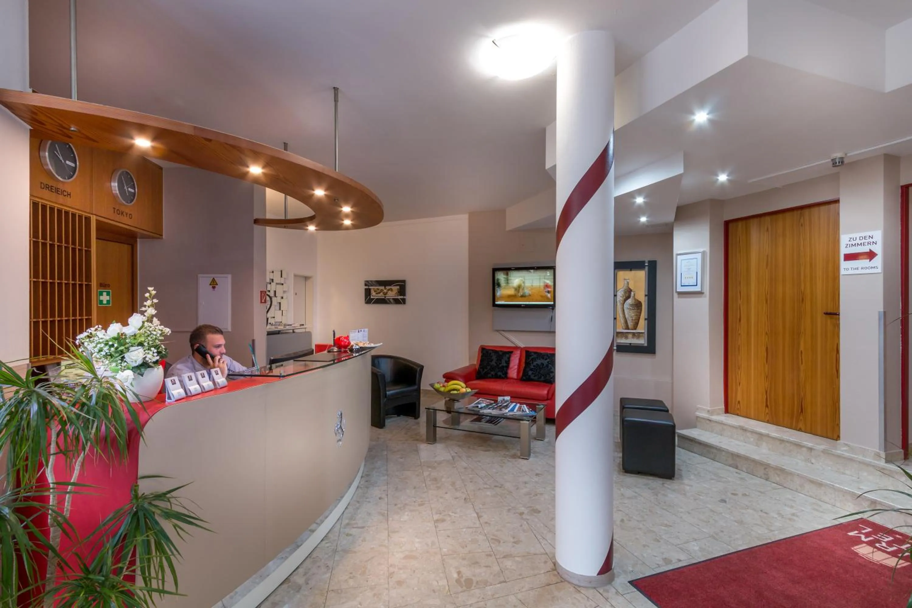 Lobby or reception in Turmhotel Rhein-Main