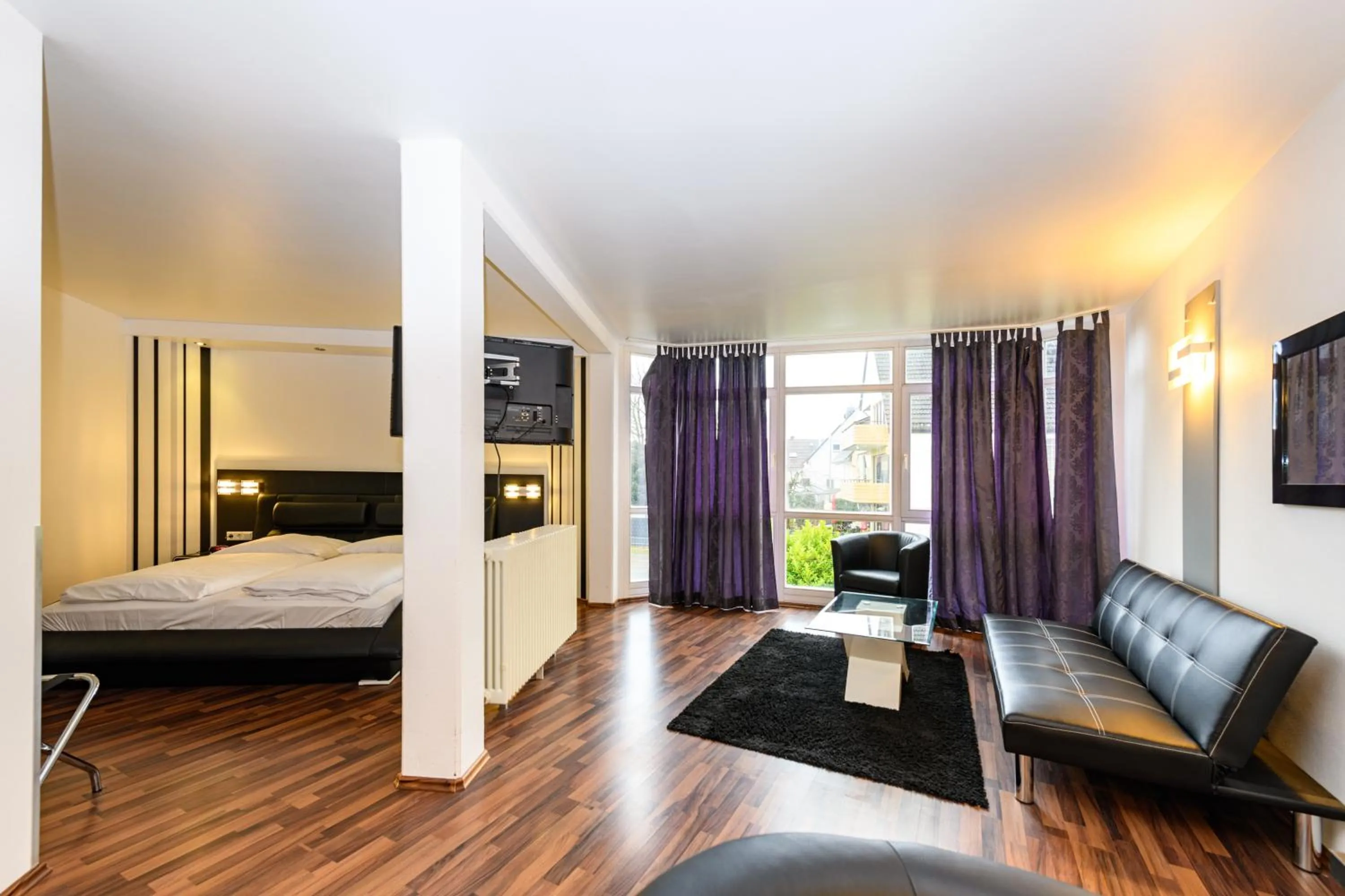 Photo of the whole room, Bed in Turmhotel Rhein-Main