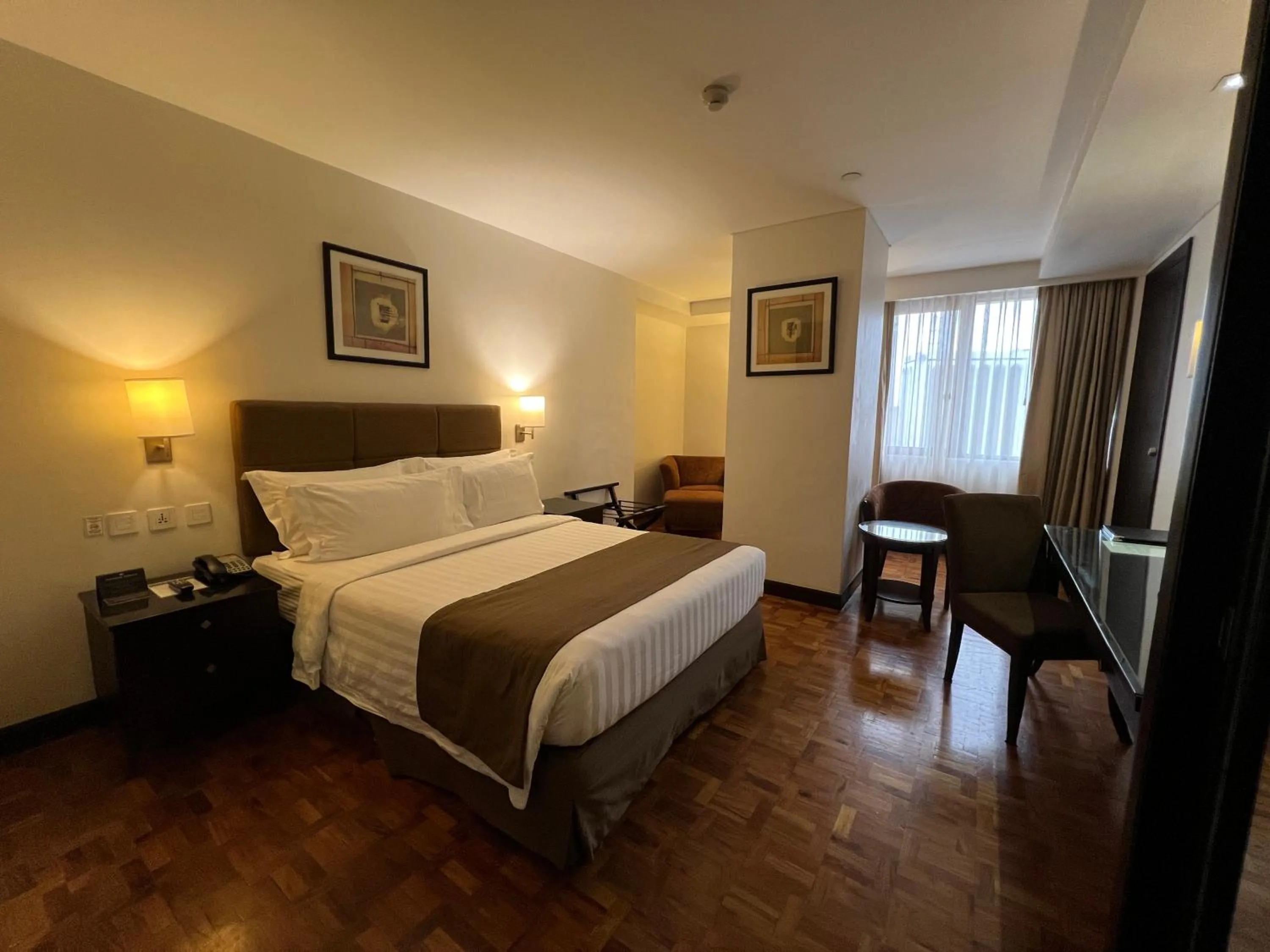 Bed in City Garden Hotel Makati