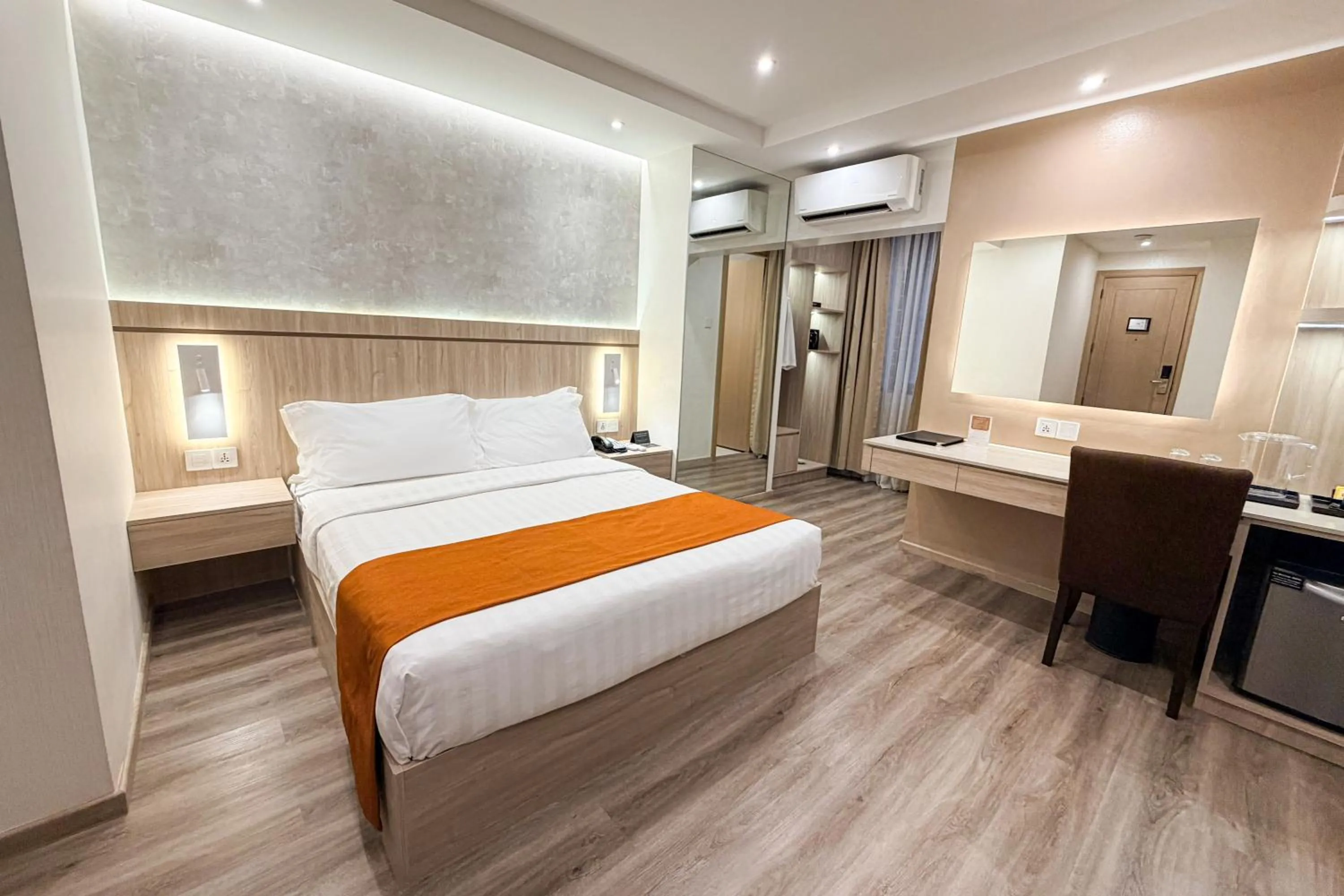 Bed in City Garden Hotel Makati