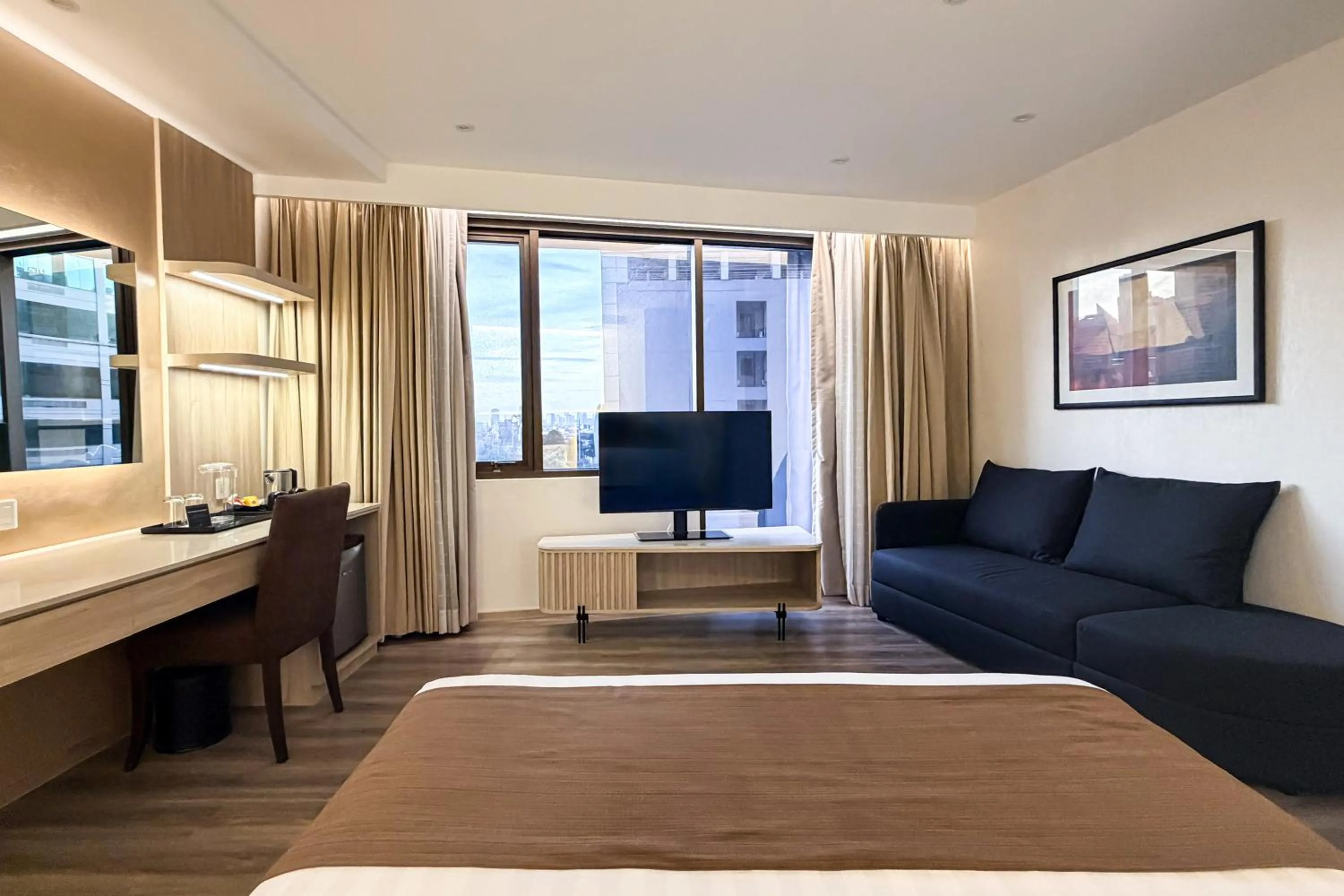 Bed in City Garden Hotel Makati