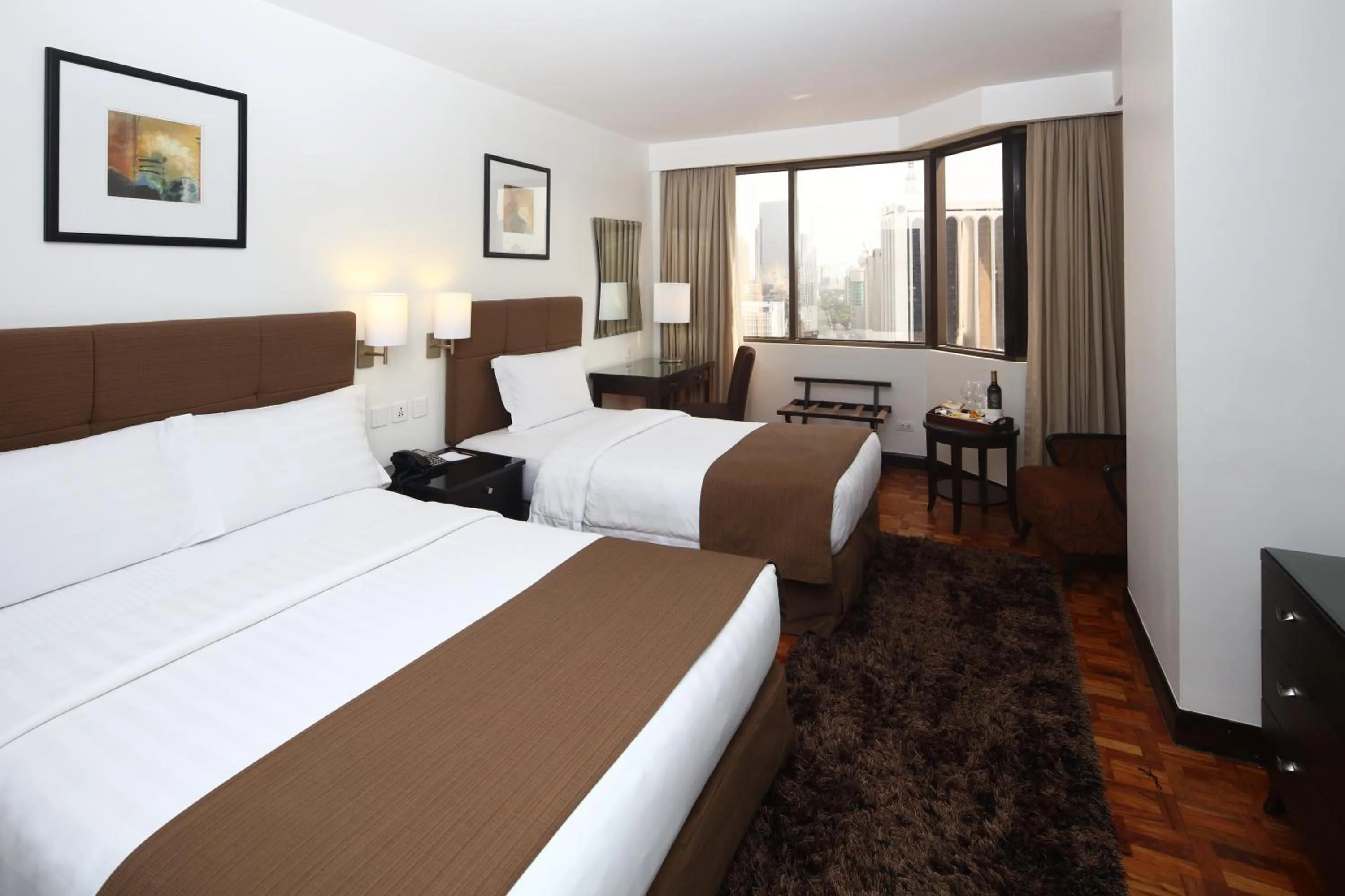 Bed in City Garden Hotel Makati