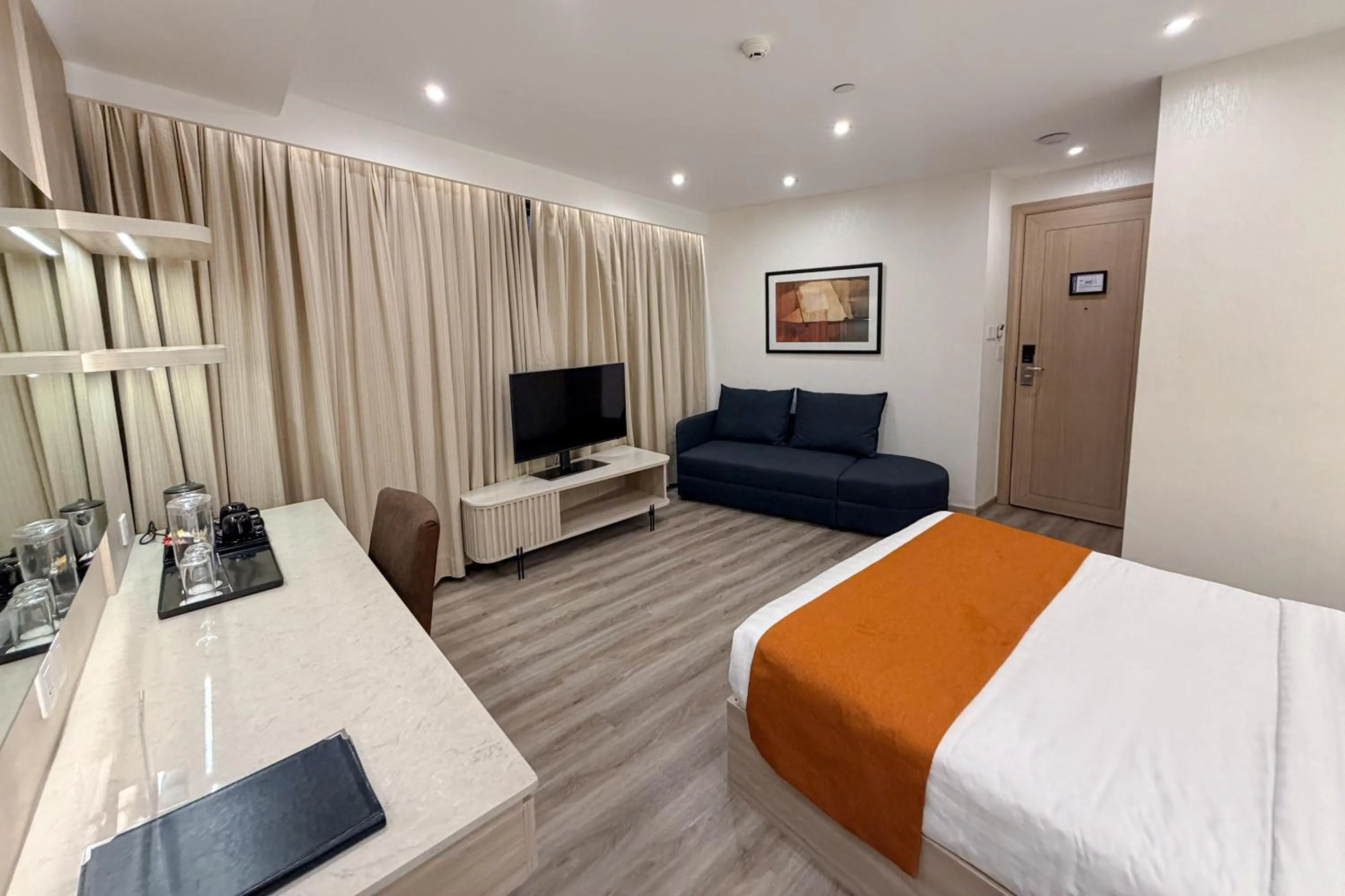 Bed in City Garden Hotel Makati