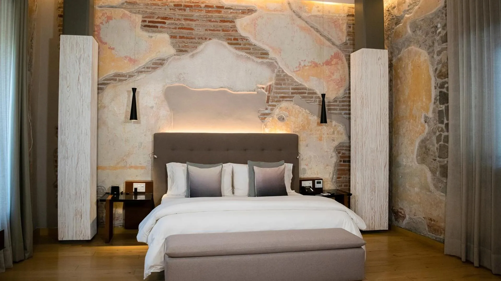 Bed in Cartesiano Boutique & Wellness Hotel