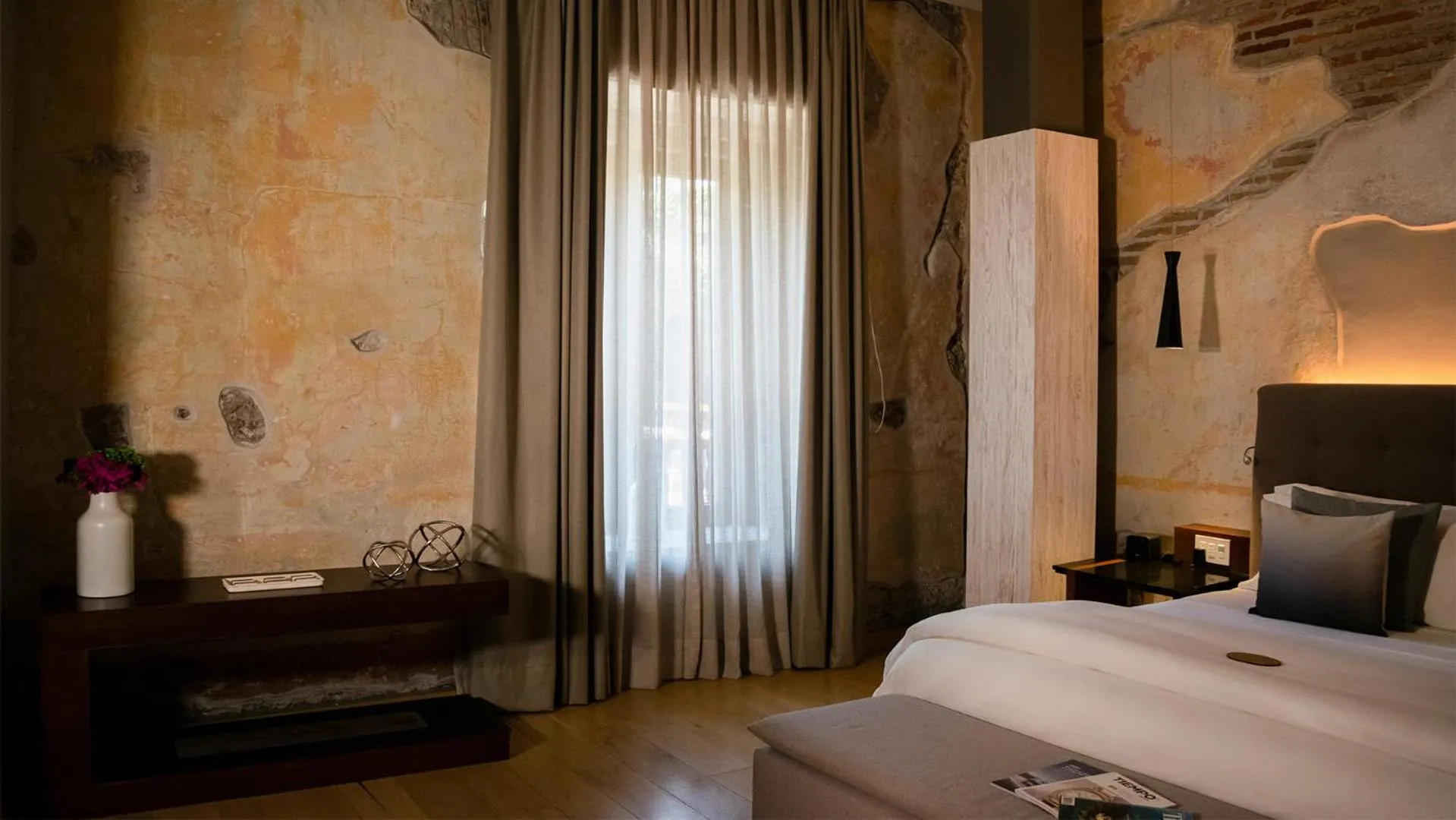 Bed in Cartesiano Boutique & Wellness Hotel