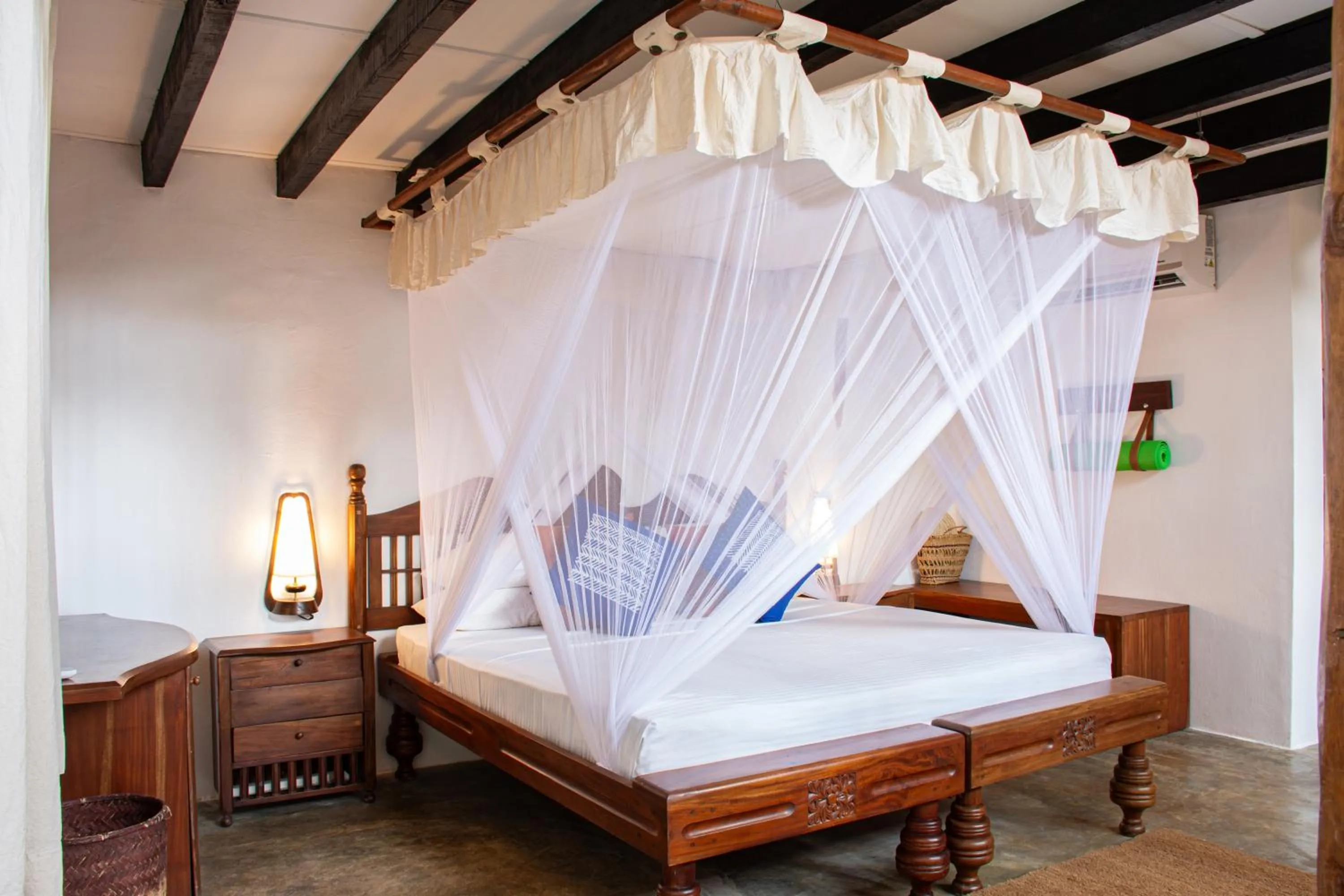 Bed in Amuna Ayurveda and Wellness Retreat