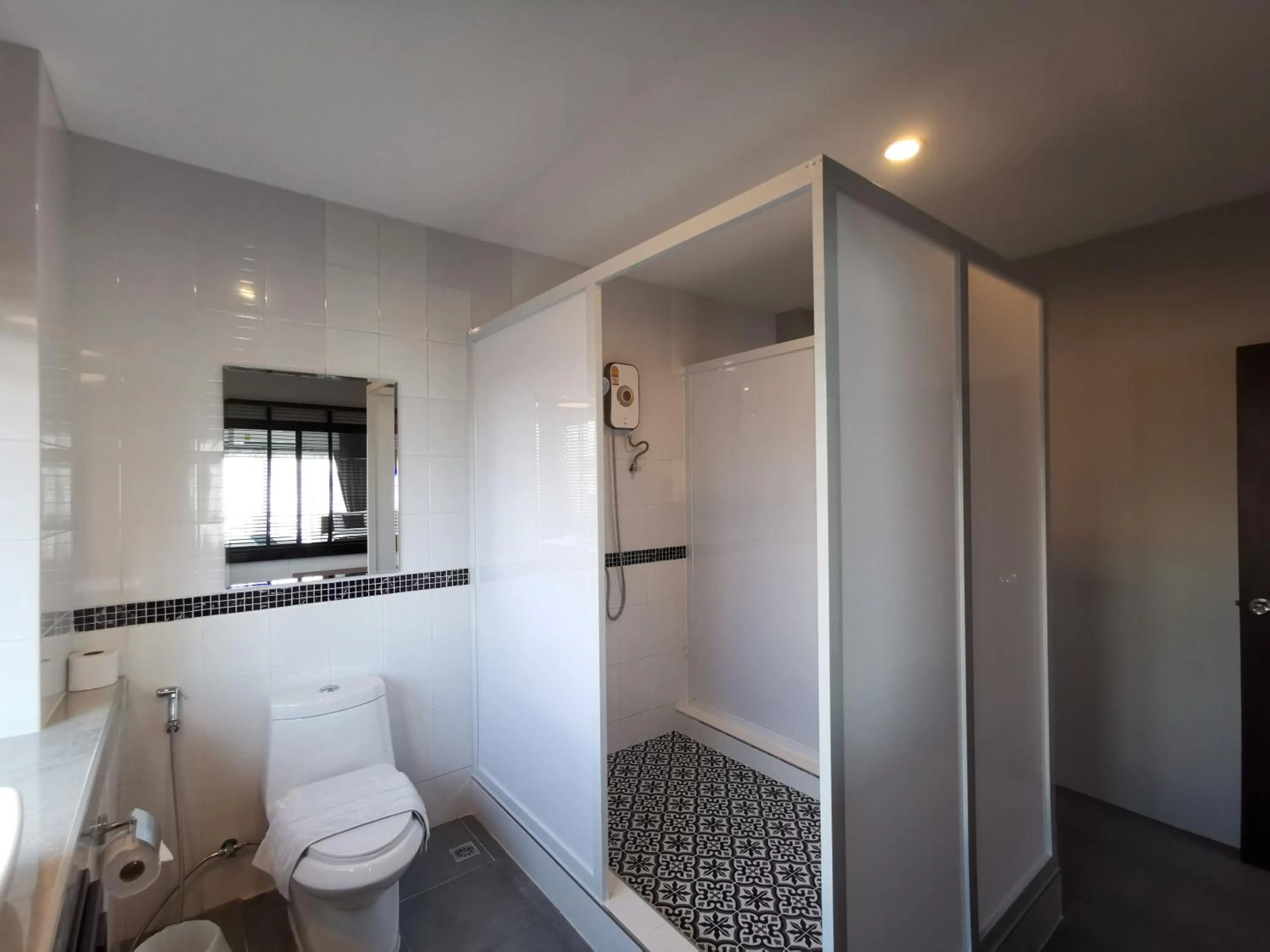 Bathroom in The Besavana Phuket - SHA Extra Plus