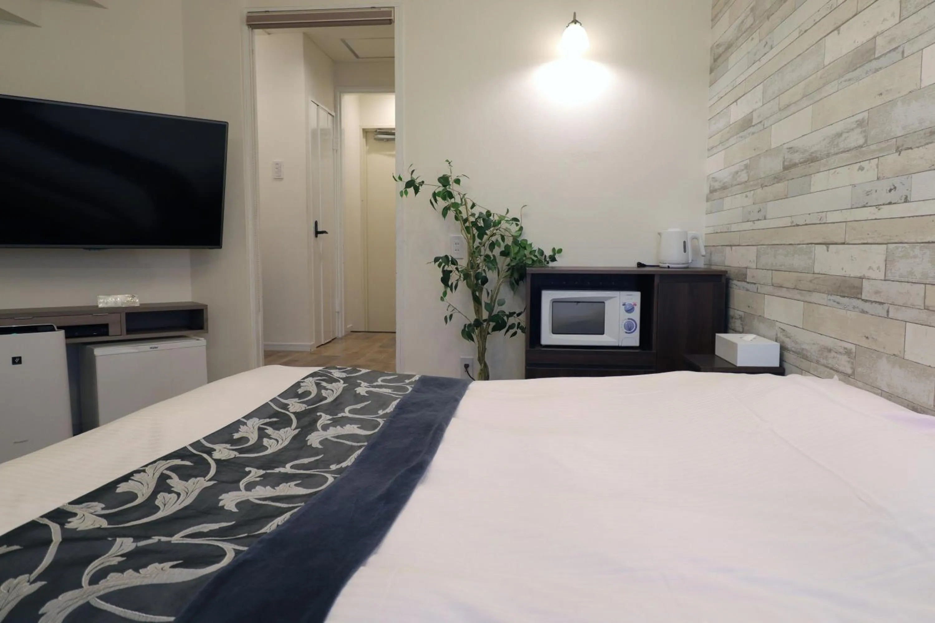 Photo of the whole room, Bed in Spa & HOTEL La fontaine