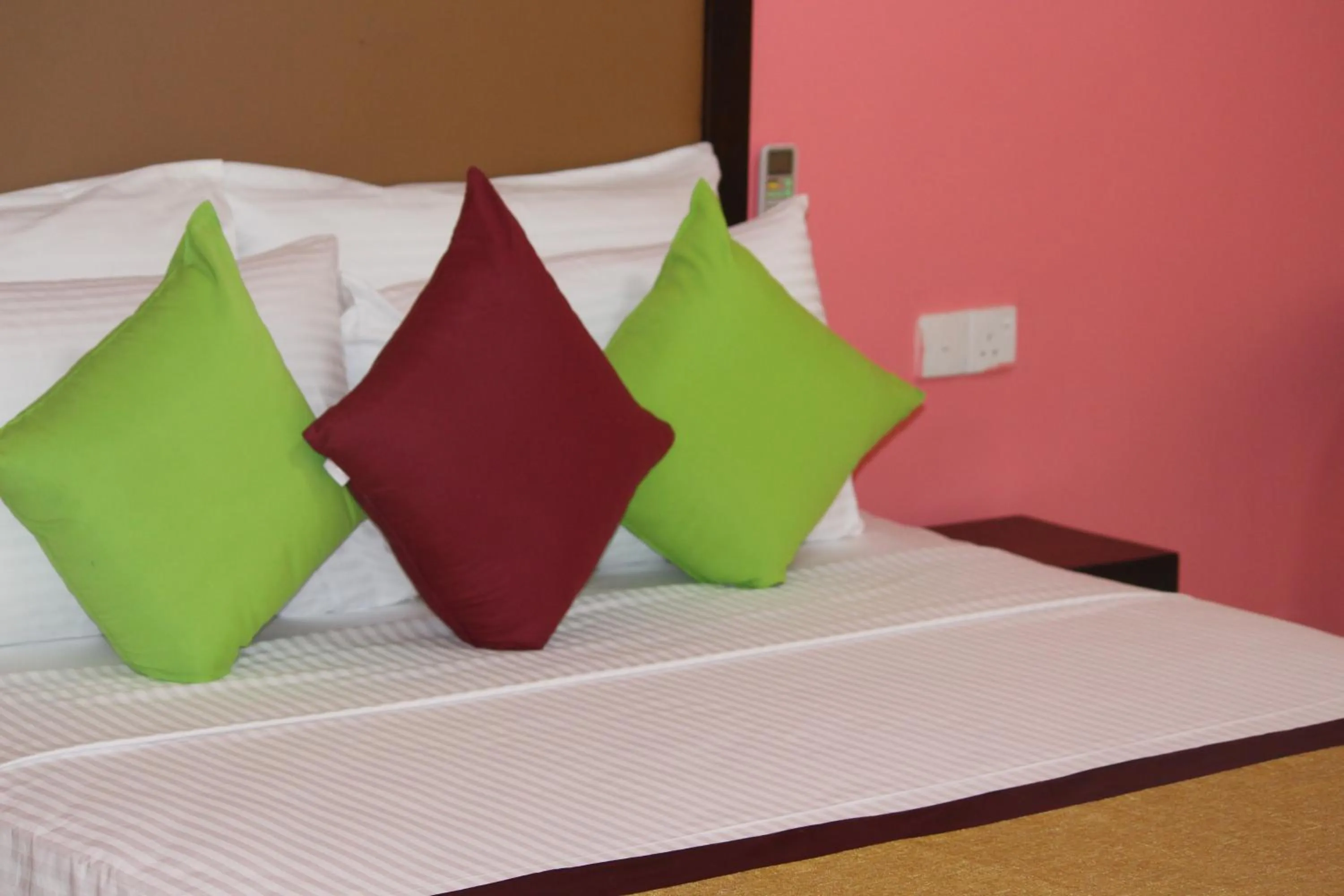 Bed in Organic Garden Resort Sigiriya