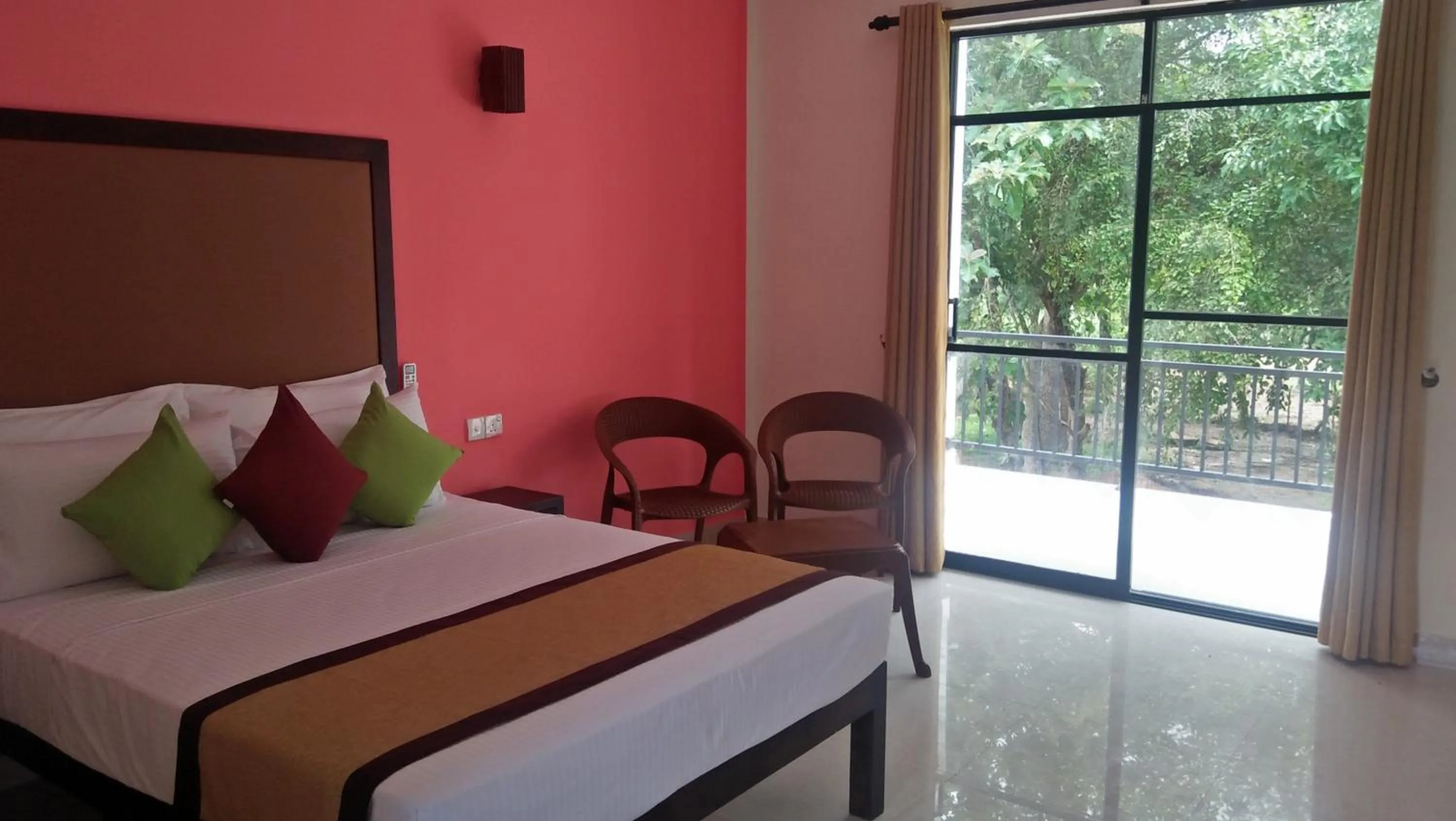 Bed in Organic Garden Resort Sigiriya