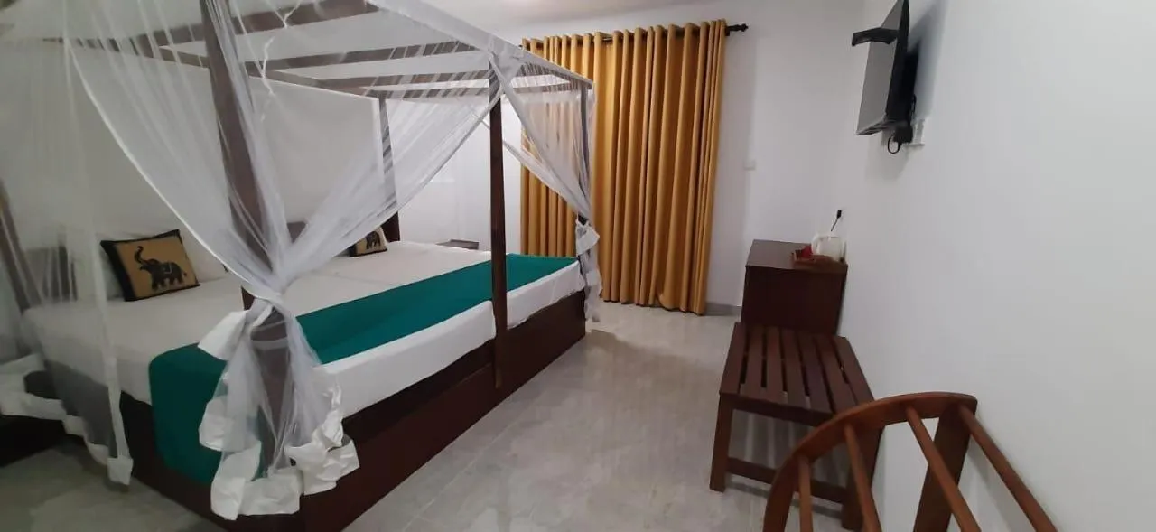 Bed in Organic Garden Resort Sigiriya