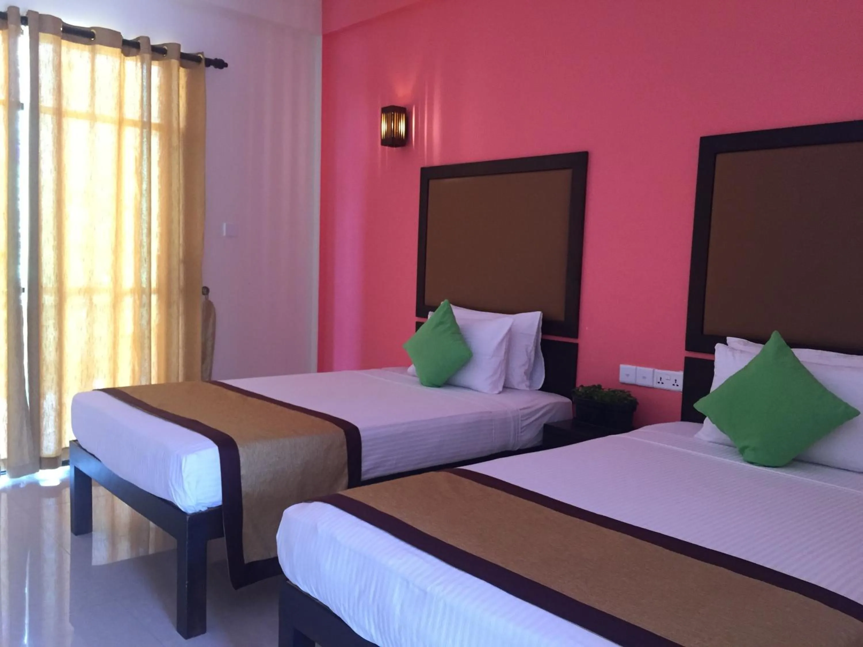 Bed in Organic Garden Resort Sigiriya