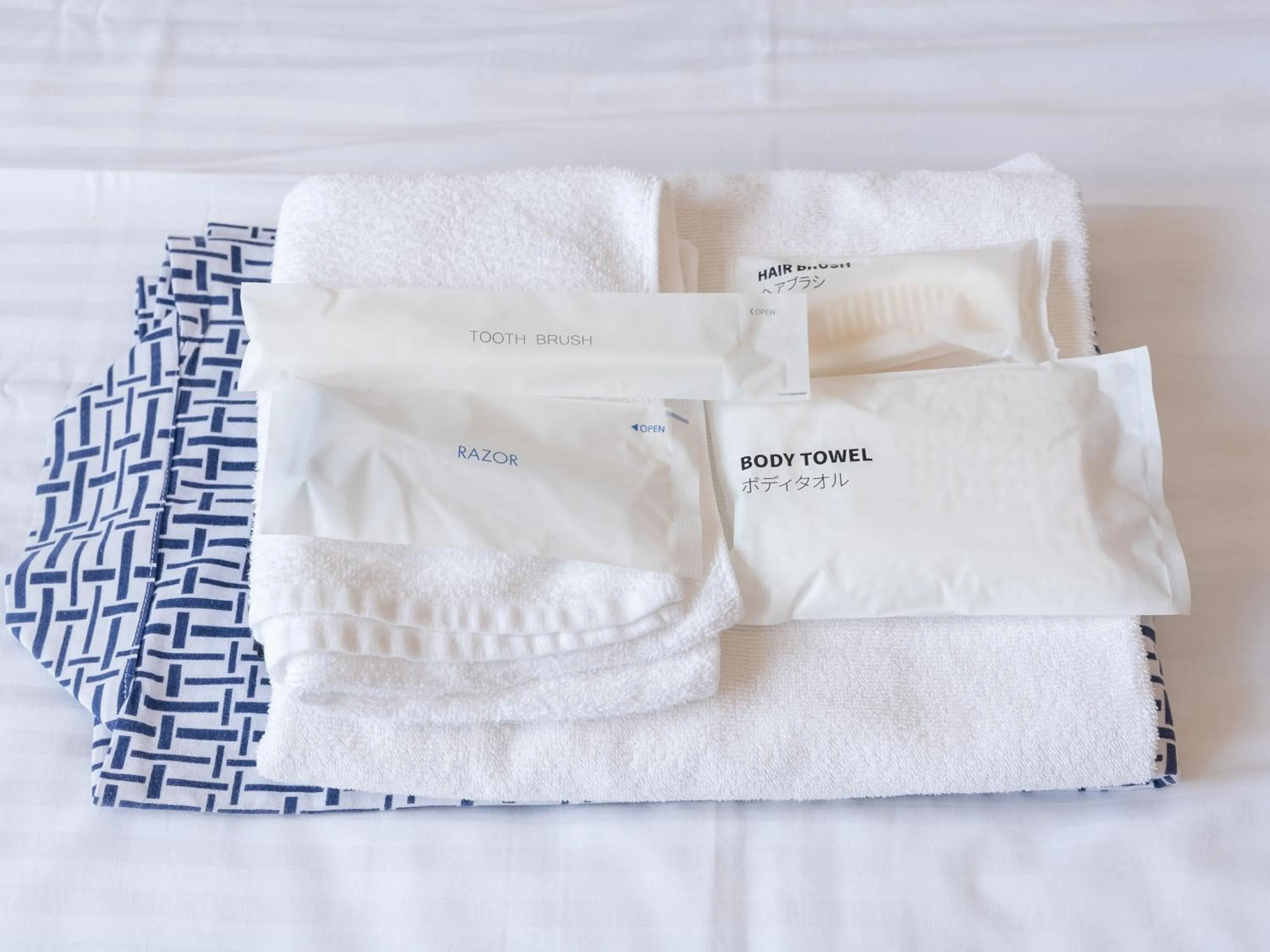 Bed in Tabist Business Hotel R Side Kanazawa