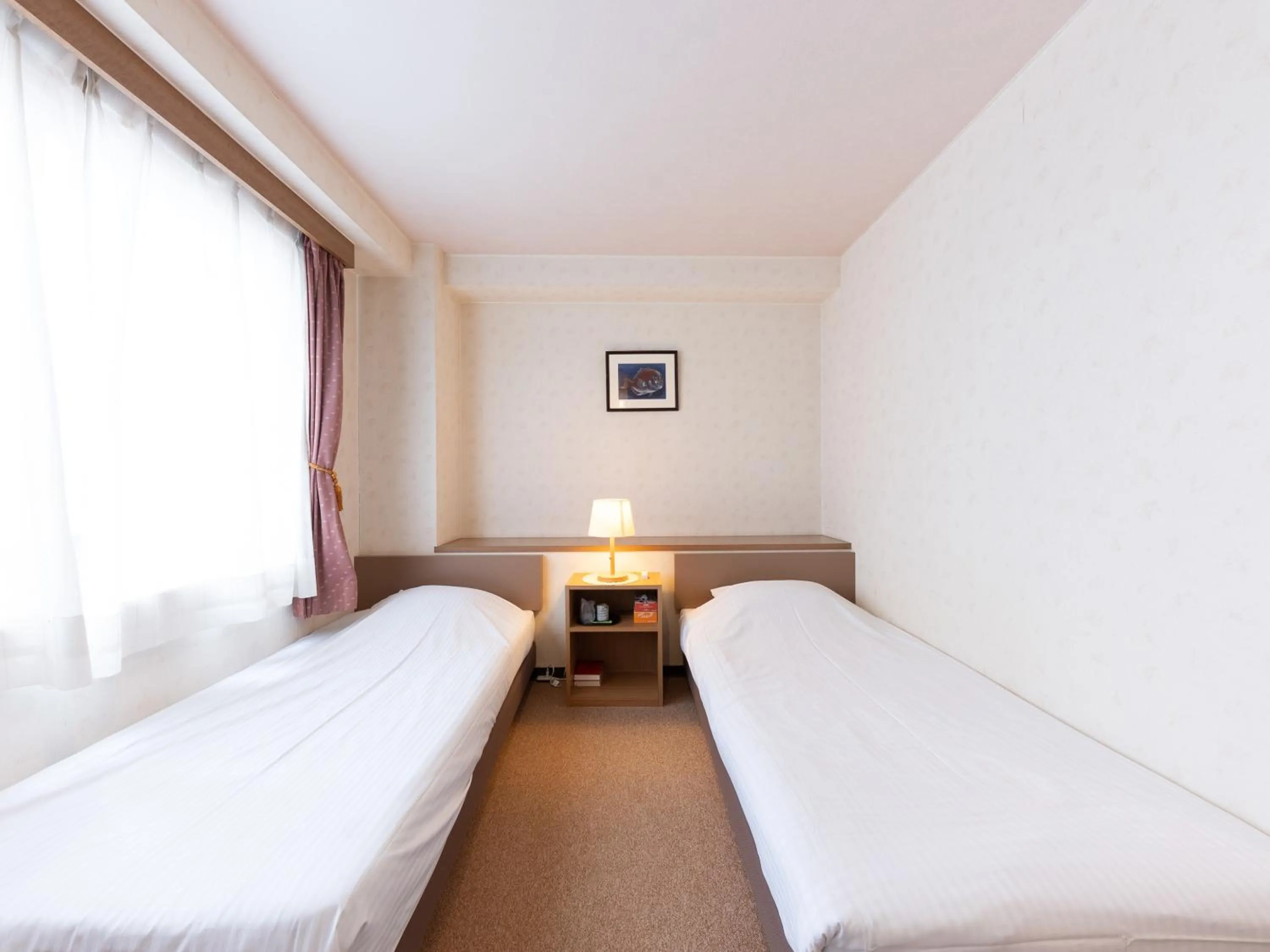 Bed in Tabist Business Hotel R Side Kanazawa