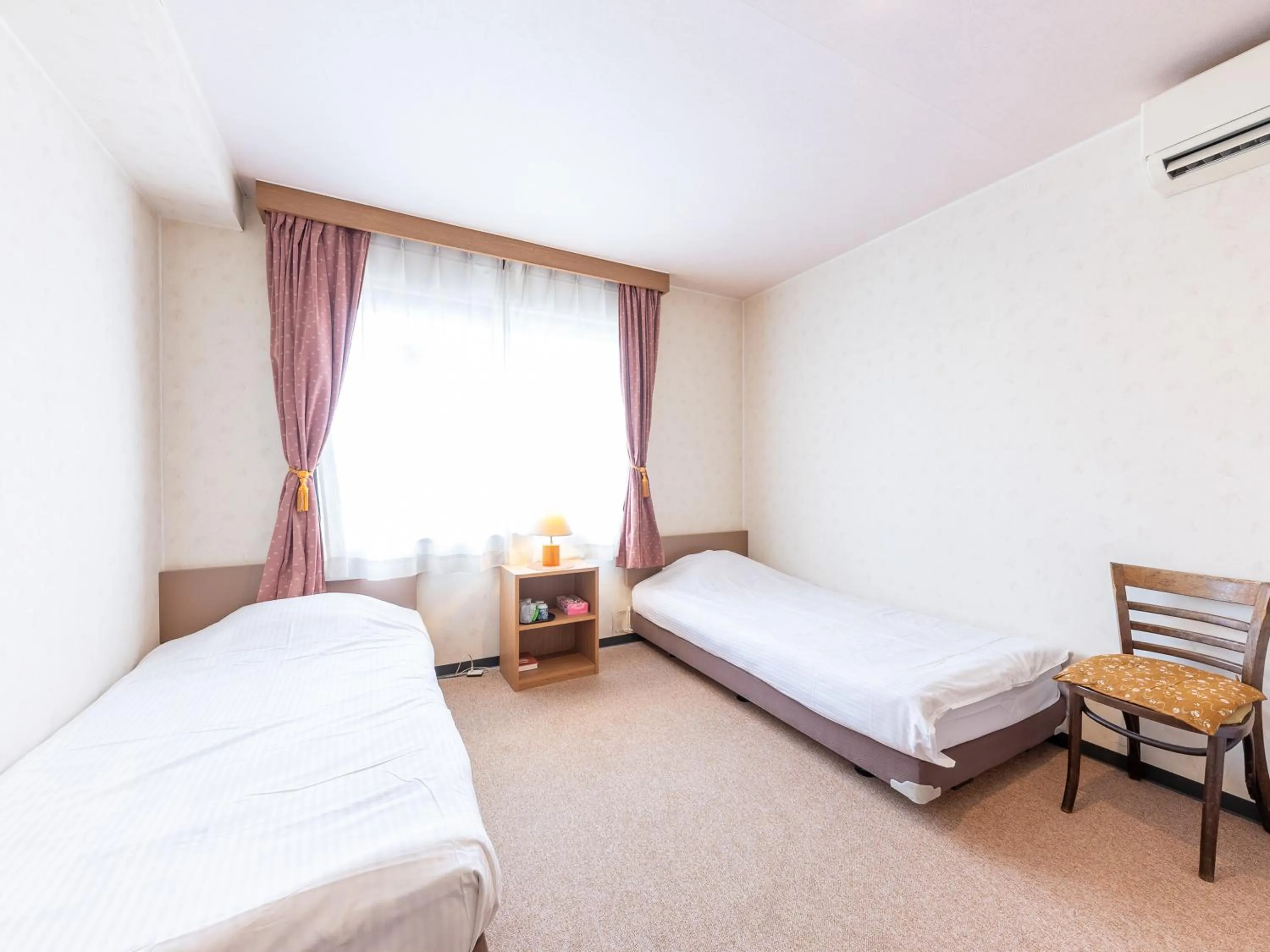 Bed in Tabist Business Hotel R Side Kanazawa